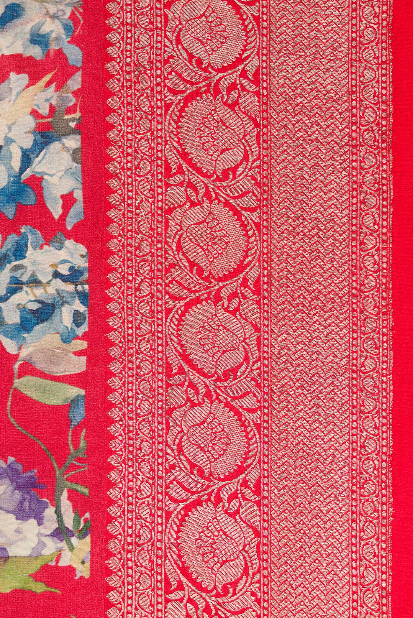 Border image of Red Dual Tone Tussar Saree with Printed design on the body and Zari Border. 