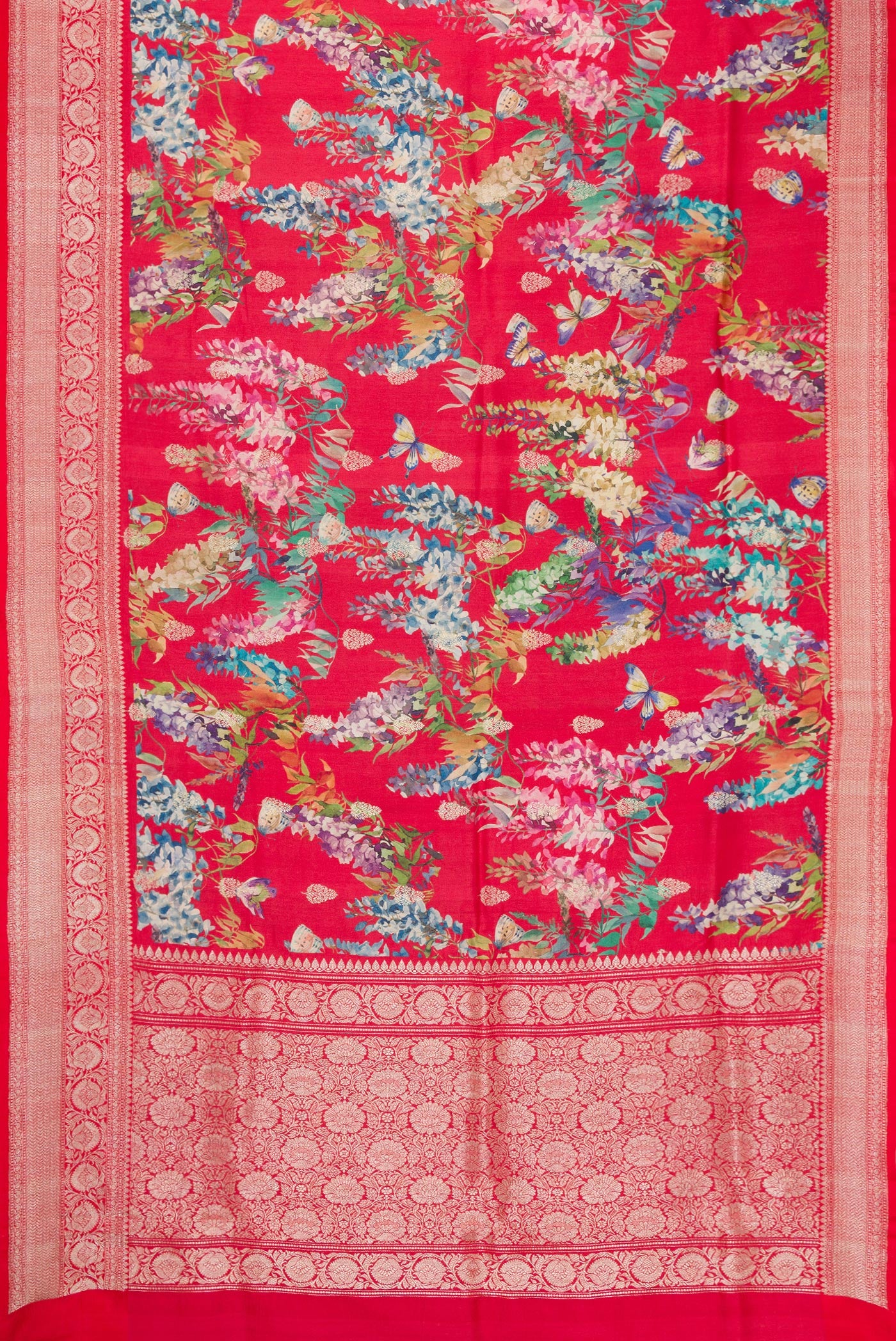 Flat view of Red Dual Tone Tussar Saree with Printed design on the body and Zari Border. 