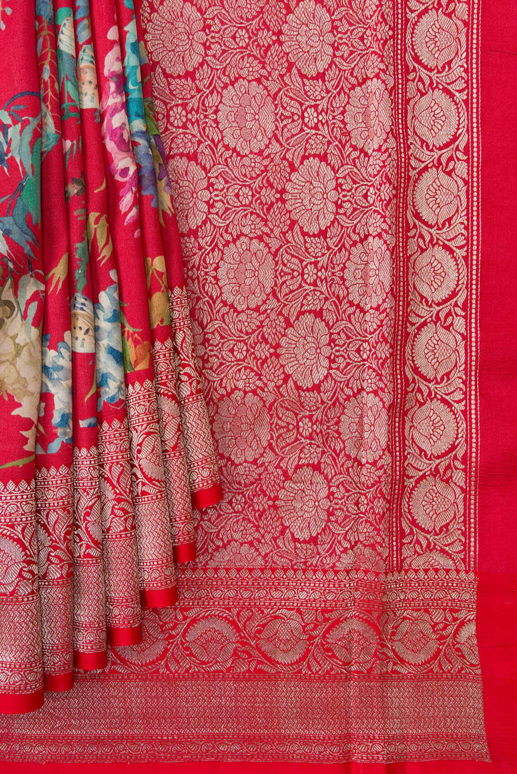 Pleats and pallu of Red Dual Tone Tussar Saree with Printed design on the body and Zari Border. 