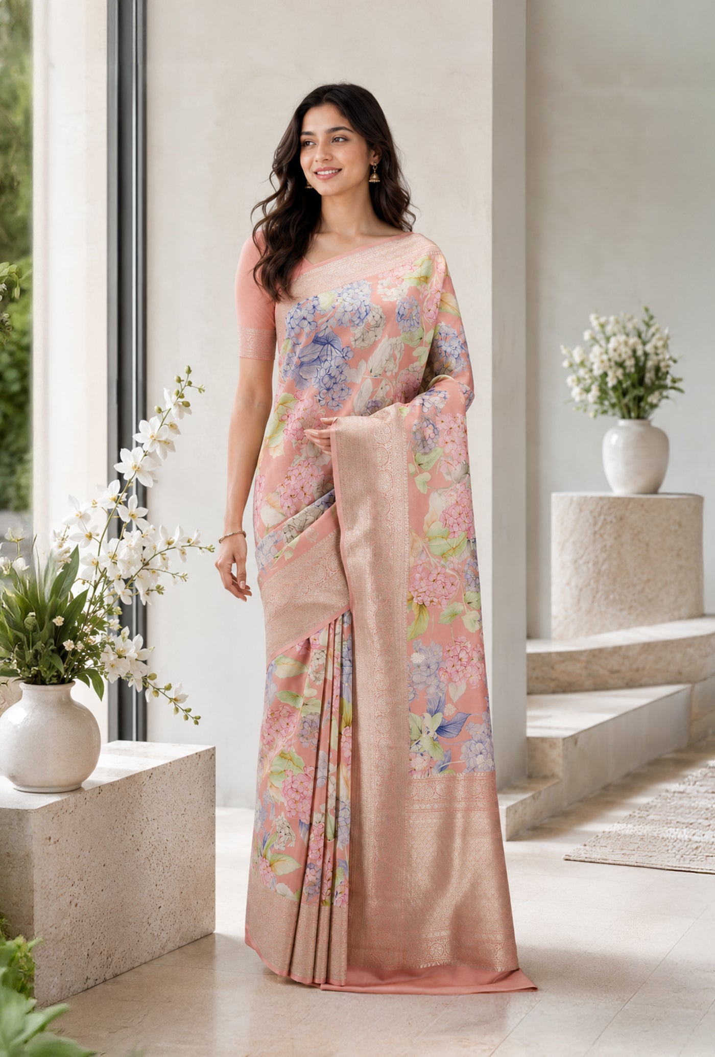 Model wearing a Rose Gold Tussar Silk Saree with Floral Print on the body and Zari Border.