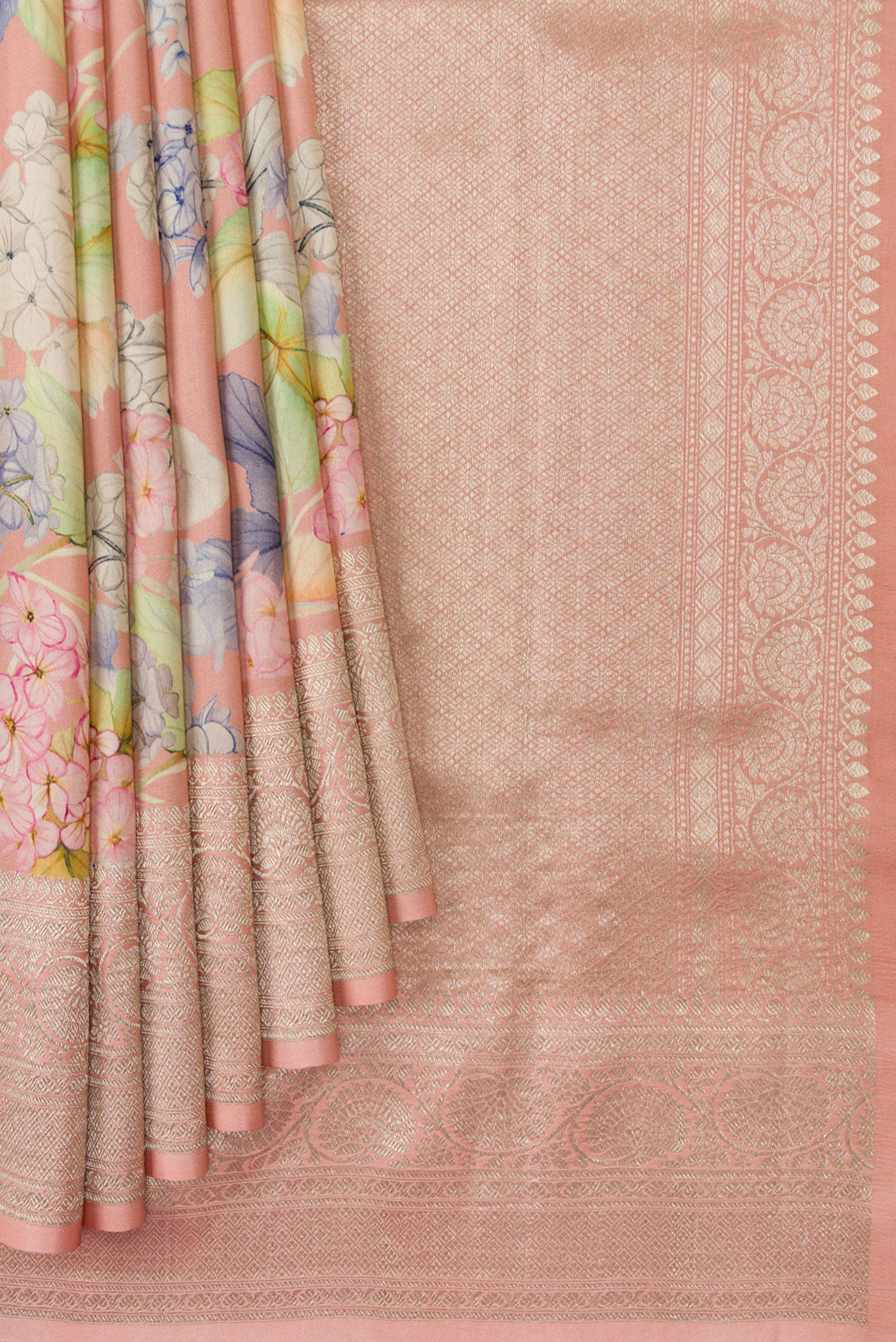 Pleats and pallu of Rose Gold Dual Tone Tussar Silk Saree with Printed design on the body and Zari Border. 