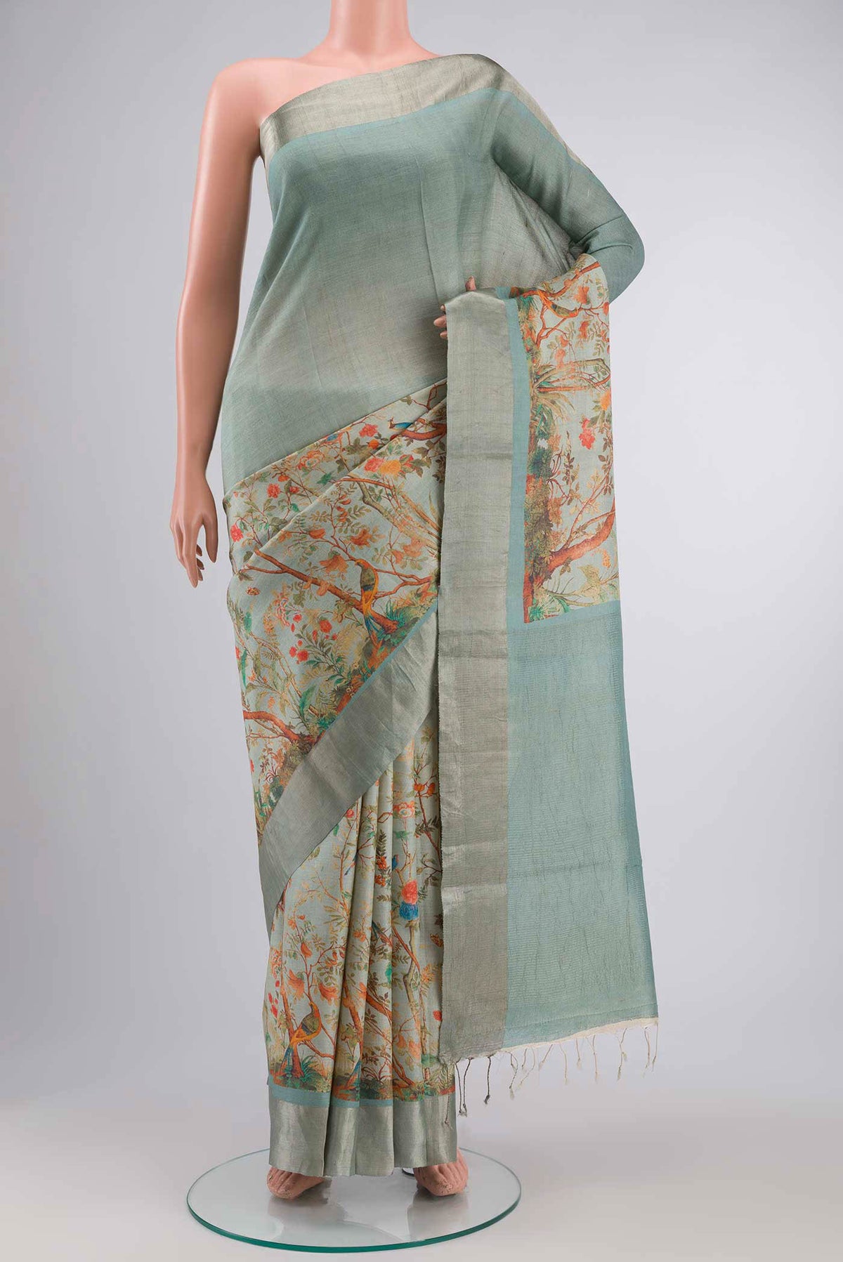 Light Green Bhagalpuri Tussar Silk SareePrinted design on the body and Zari Border displayed on a mannequin
