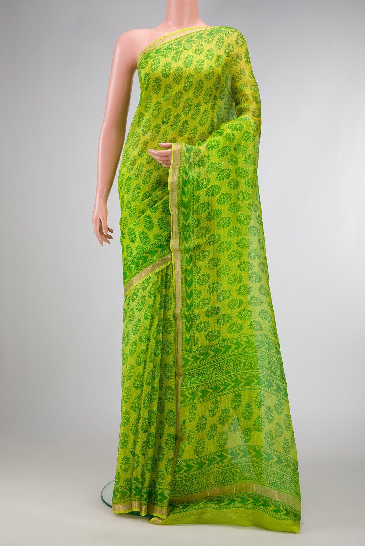 Parrot Green Dual Tone Kota Silk Saree with Printed design on the body and Zari Border.  displayed on a mannequin