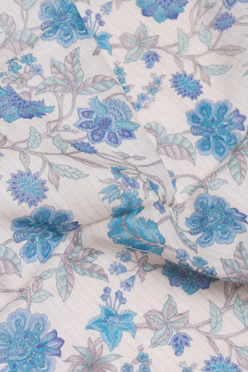 Close up of Beige Chanderi Silk Cotton Saree with Printed design on the body and Zari And Thread Border.  displaying folds