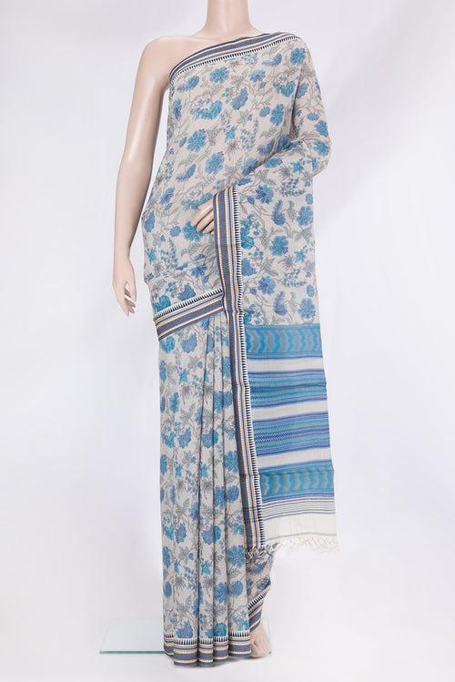 Beige Chanderi Silk Cotton Saree with Printed design on the body and Zari And Thread Border.  displayed on a mannequin