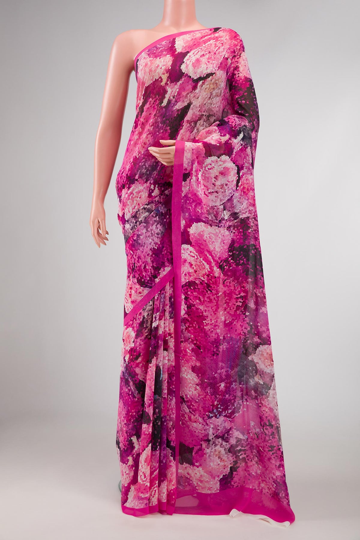 Pink Dual Tone Mysore Georgette Saree with Printed design on the body and Plain Border displayed on a mannequin