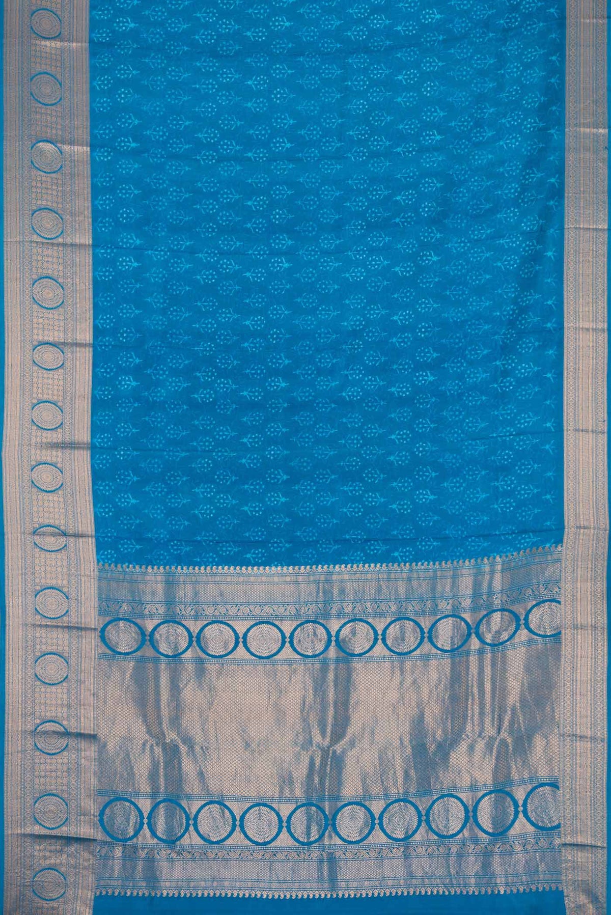 Flat view of Blue Dual Tone Kanchipuram Silk Saree with Printed design on the body and Zari Border