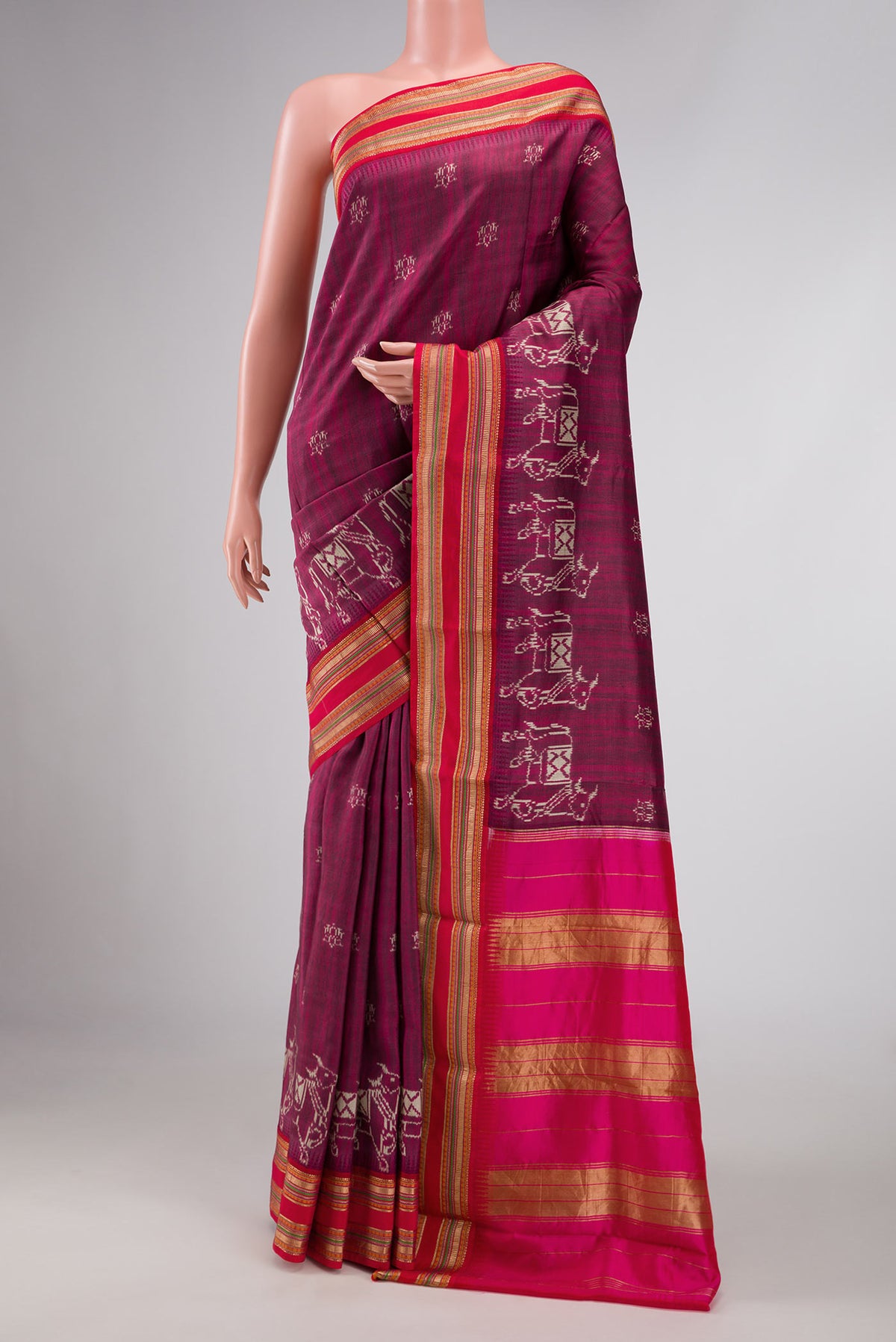 Purple Dual Tone Kanchipuram Silk Saree with Printed design on the body and Thread Border displayed on a mannequin