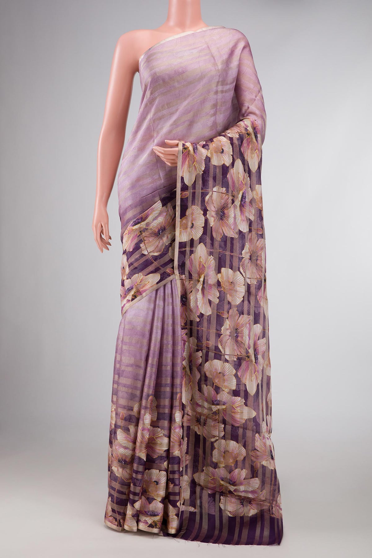 Lavender Dual Tone Mysore Georgette Saree with Printed design on the body and Zari Border displayed on a mannequin