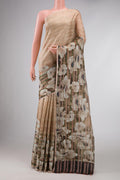 Beige Dual Tone Mysore Georgette Saree with Stripes on the body and Zari Border displayed on a mannequin