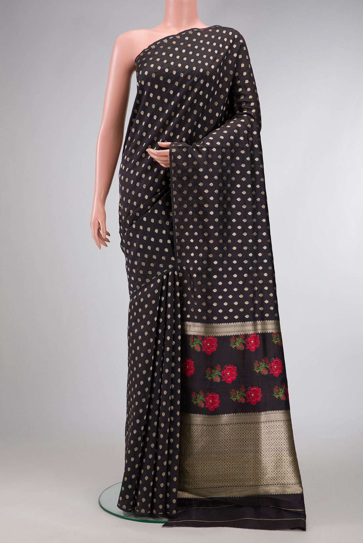 Black Dual Tone Tussar Silk Saree with Zari Butta on the body and Without Border.  displayed on a mannequin