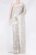 Grey Tussar Silk Saree with Printed design on the body and Printed Border.  displayed on a mannequin