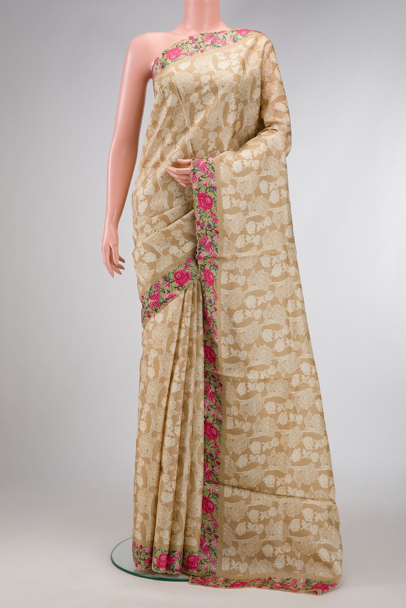 Beige Dual Tone Tussar Silk Saree with Printed design on the body and Printed Border.  displayed on a mannequin