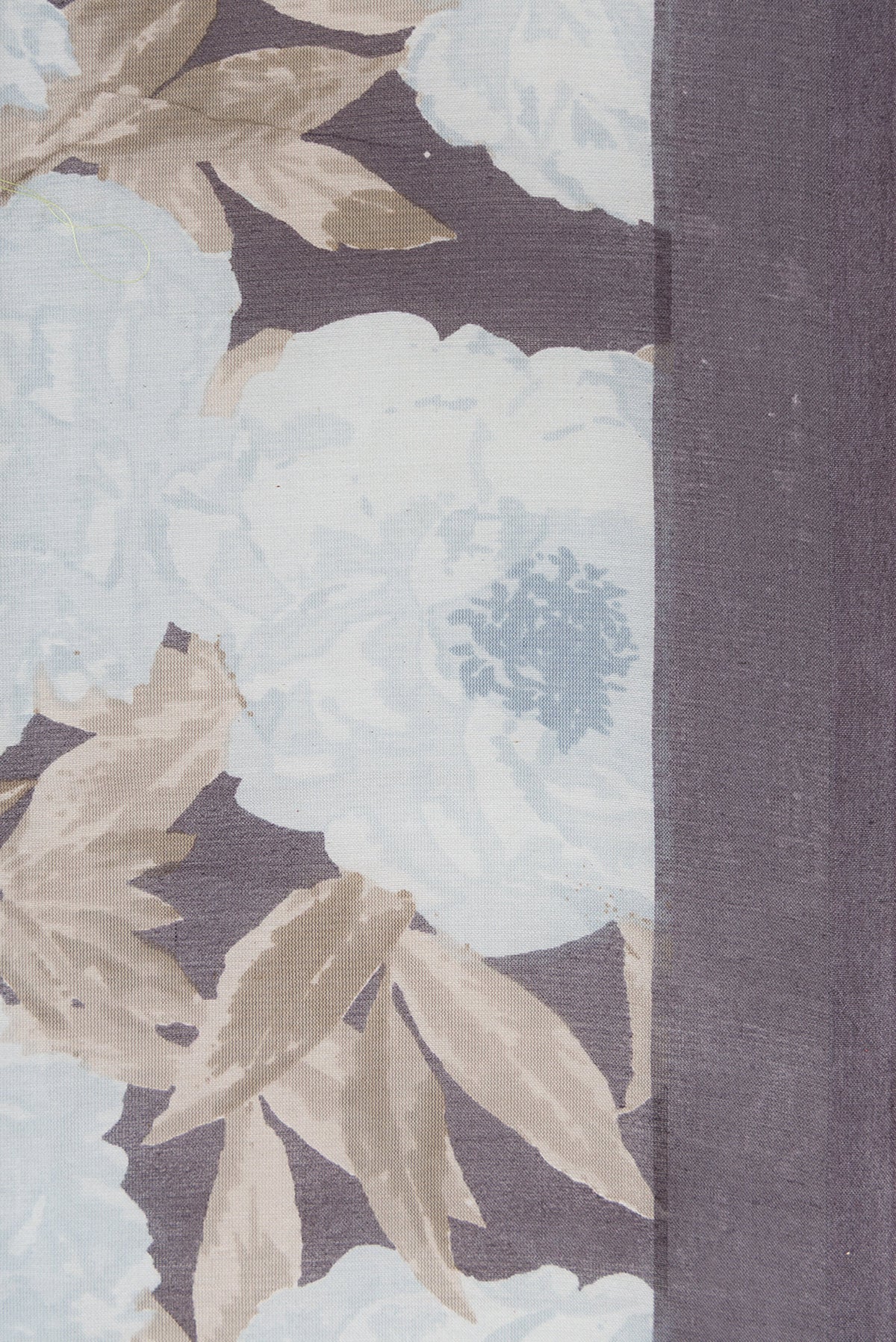 Border image of Grey Dual Tone Tussar Silk Saree with Printed design on the body and Plain Border. 