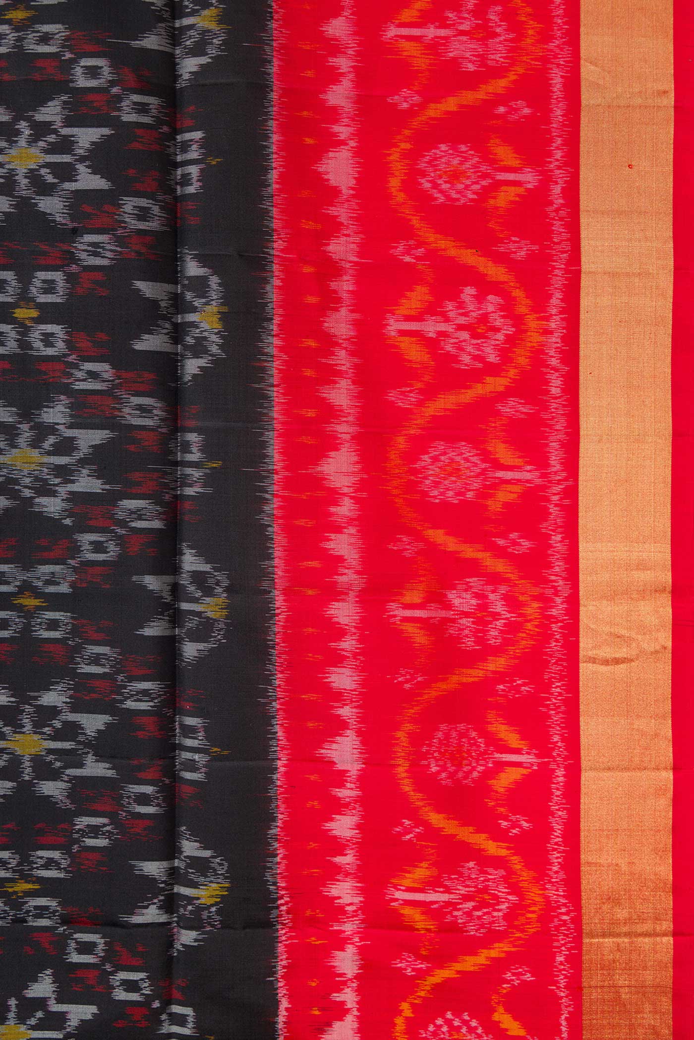 Border image of Black Dual Tone Soft Silk Saree with Ikat Print on the body and Ikat Border. 