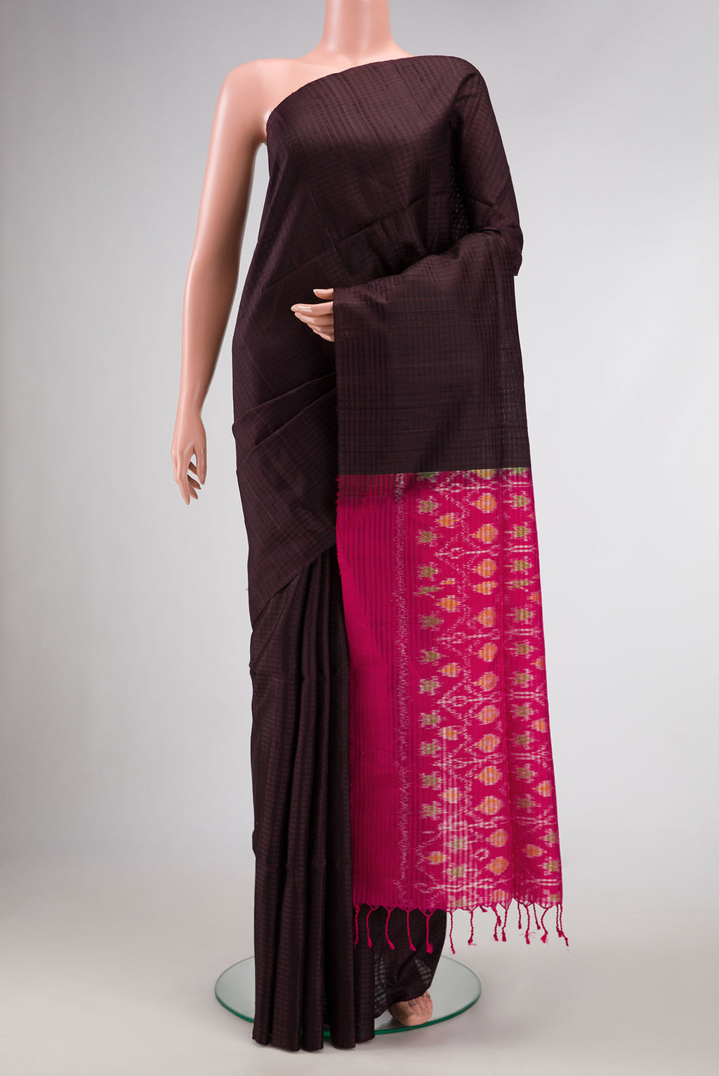 Coffee Brown Dual Tone Soft Silk Saree with Checked design on the body and Without Border.  displayed on a mannequin