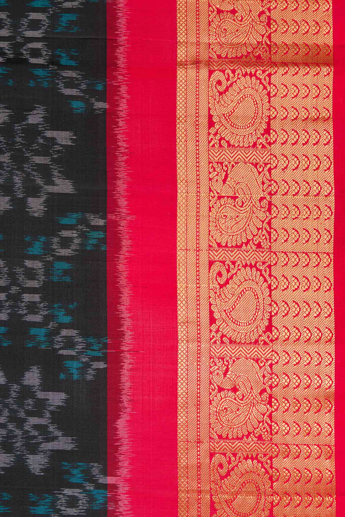 Border image of Black Dual Tone Soft Silk Saree with Ikat Print on the body and Zari Border. 