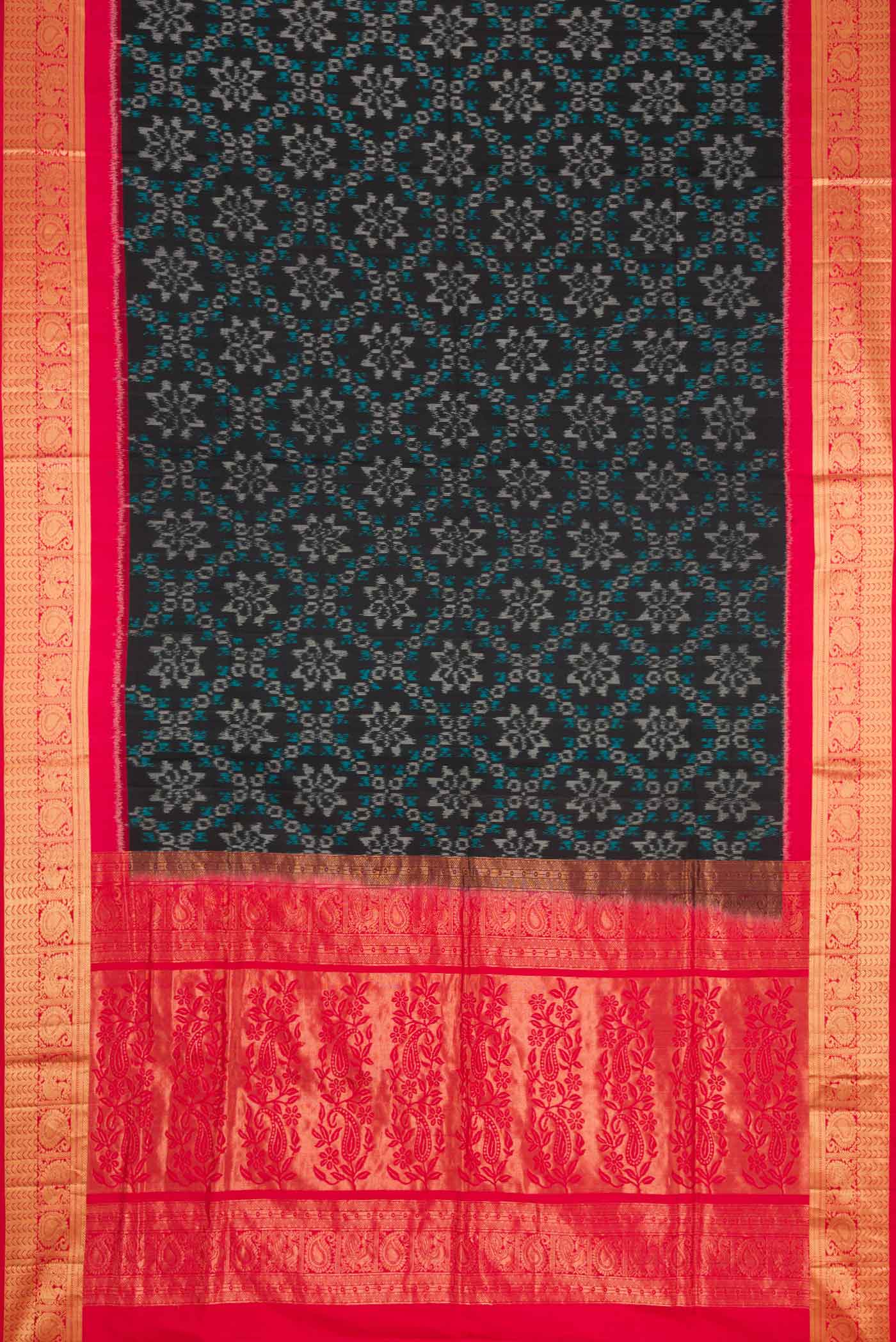 Flat view of Black Dual Tone Soft Silk Saree with Ikat Print on the body and Zari Border. 