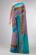 Off White Dual Tone Double Ikat Saree with Ikat Print on the body and Zari Border.  displayed on a mannequin