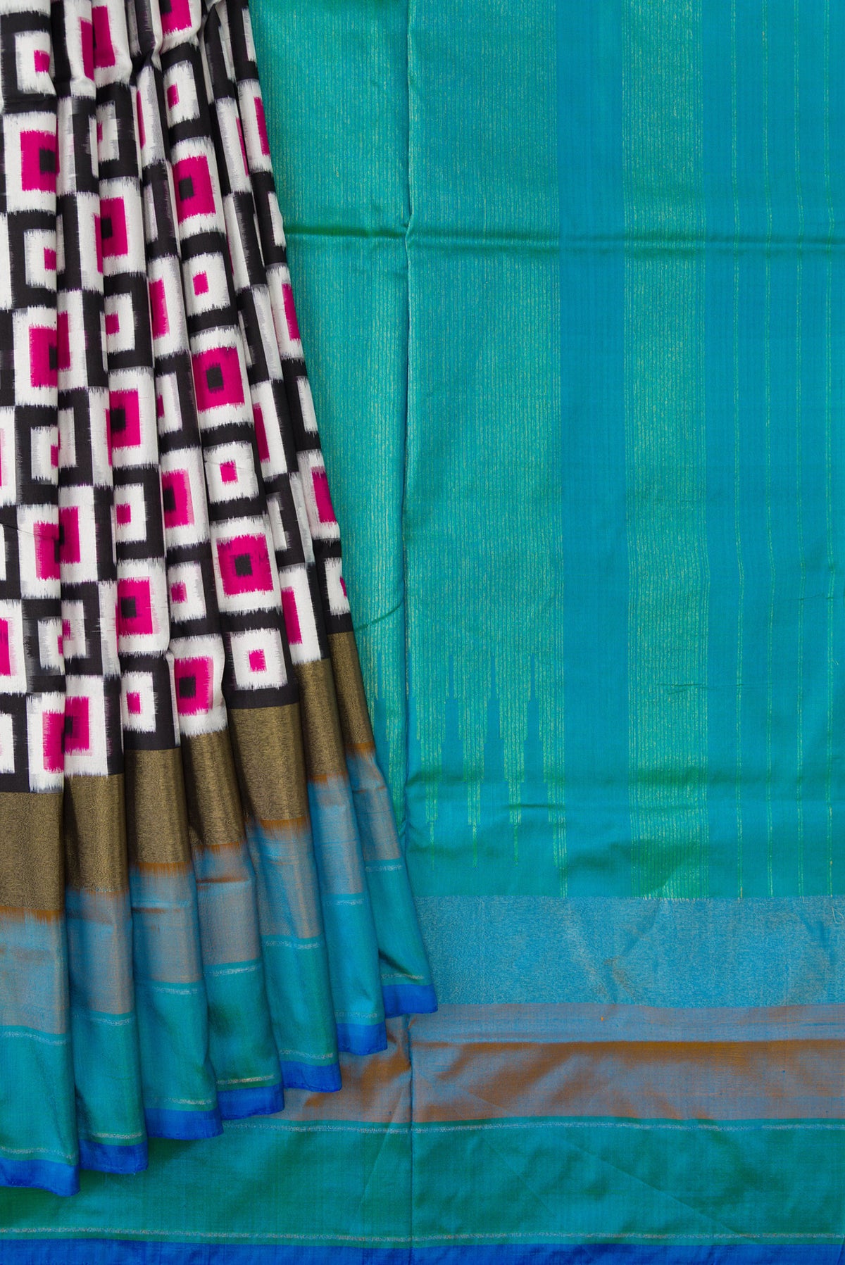 Pleats and pallu of Off White Dual Tone Double Ikat Saree with Ikat Print on the body and Zari Border. 