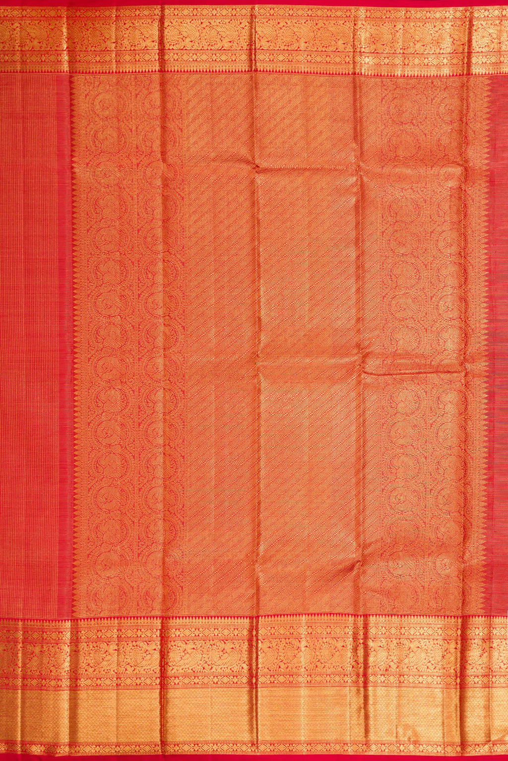 Close up image of the pallu of Red Dual Tone Kanchipuram Silk Saree with Zari Brocade on the body and Zari Border. 