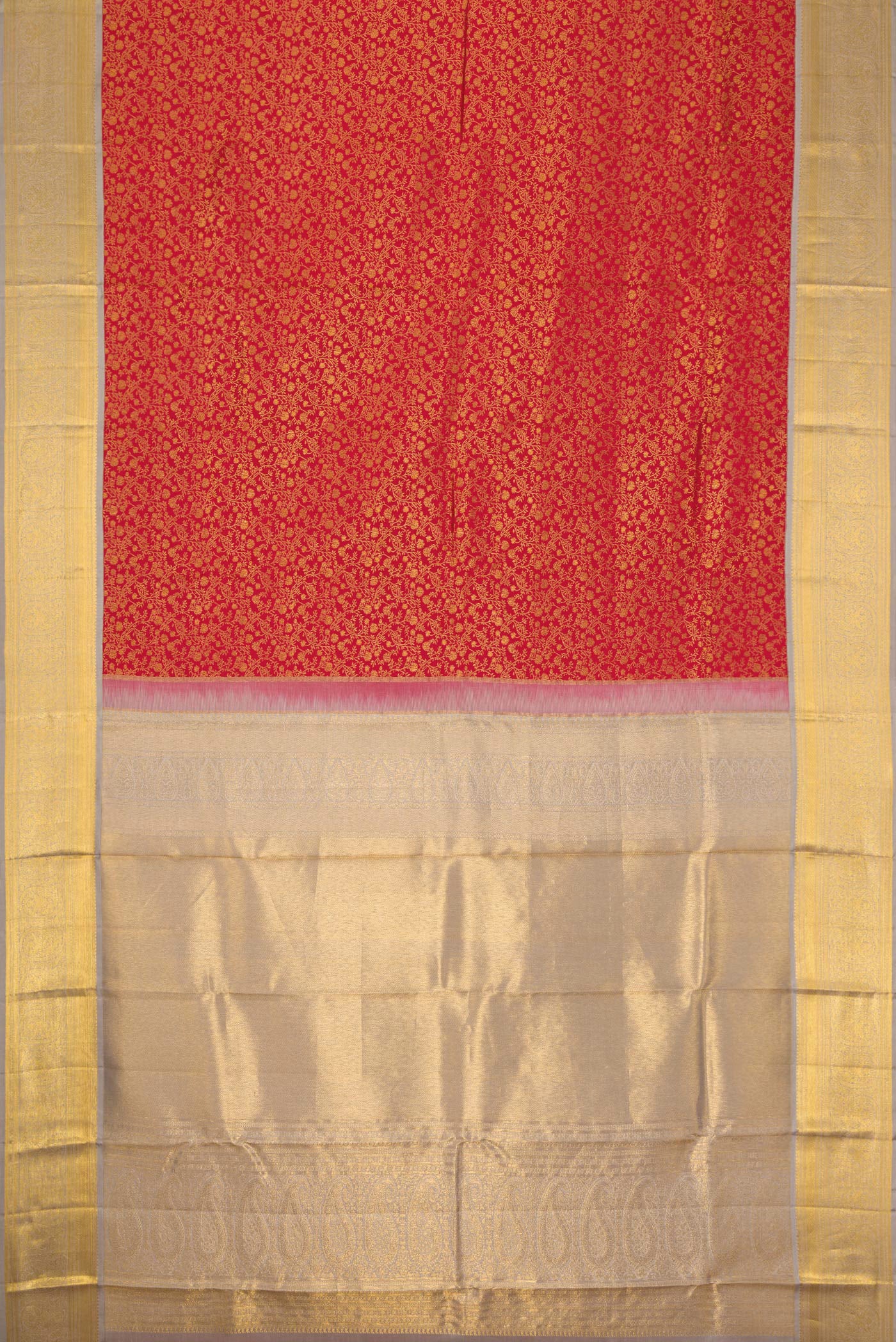 Flat view of Red Dual Tone Kanjivaram Silk Saree with Zari Brocade on the body and Zari Border. 