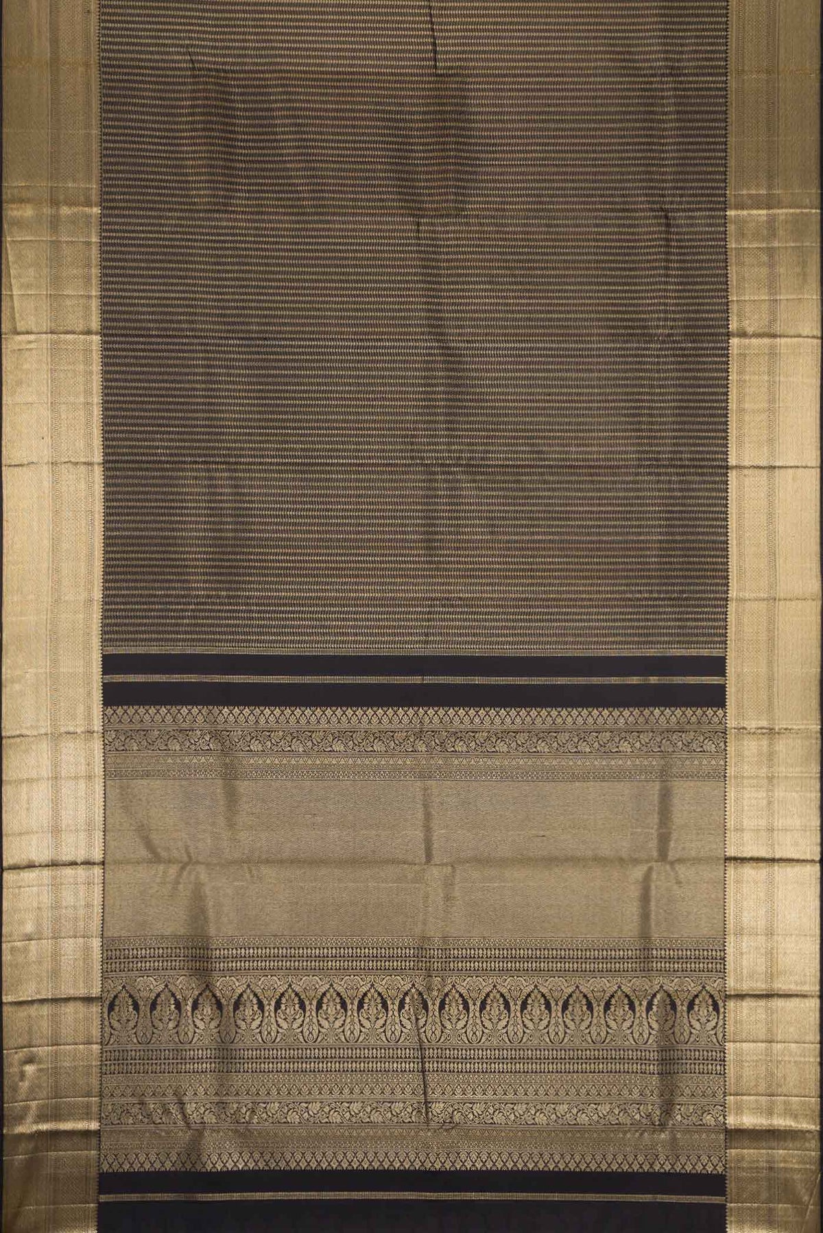 Flat view of Black Dual Tone Kanjivaram Silk Saree with Zari Brocade on the body and Zari Border. 