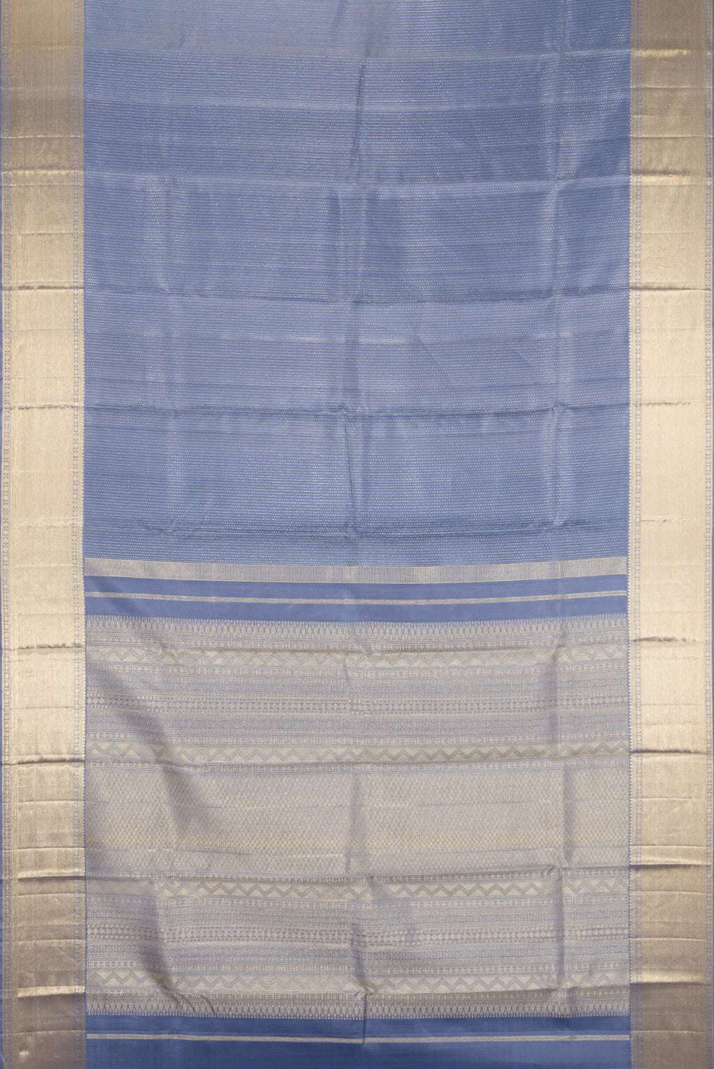 Flat view of Blue Grey Kanjivaram Silk Saree with Jacquard design on the body and Zari Border. 