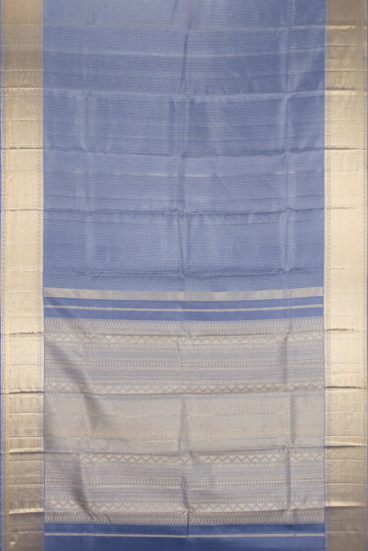 Flat view of Blue Grey Kanjivaram Silk Saree with Jacquard design on the body and Zari Border. 