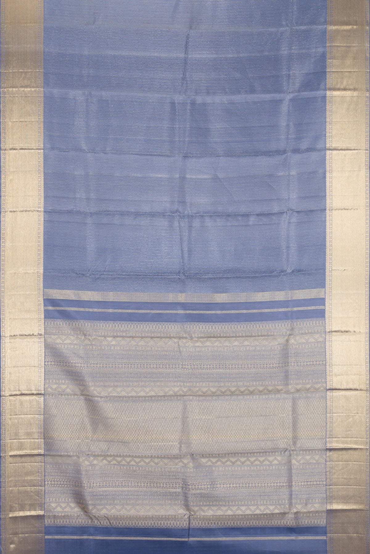 Flat view of Blue Grey Kanjivaram Silk Saree with Jacquard design on the body and Zari Border. 