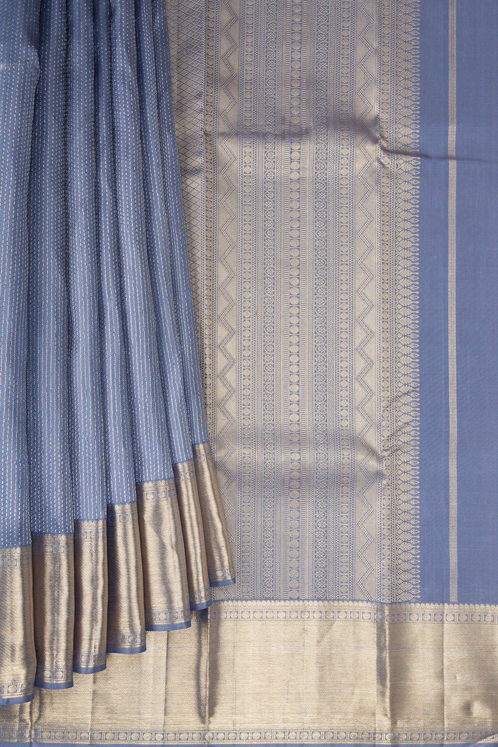 Pleats and pallu of Blue Grey Kanjivaram Silk Saree with Jacquard design on the body and Zari Border. 