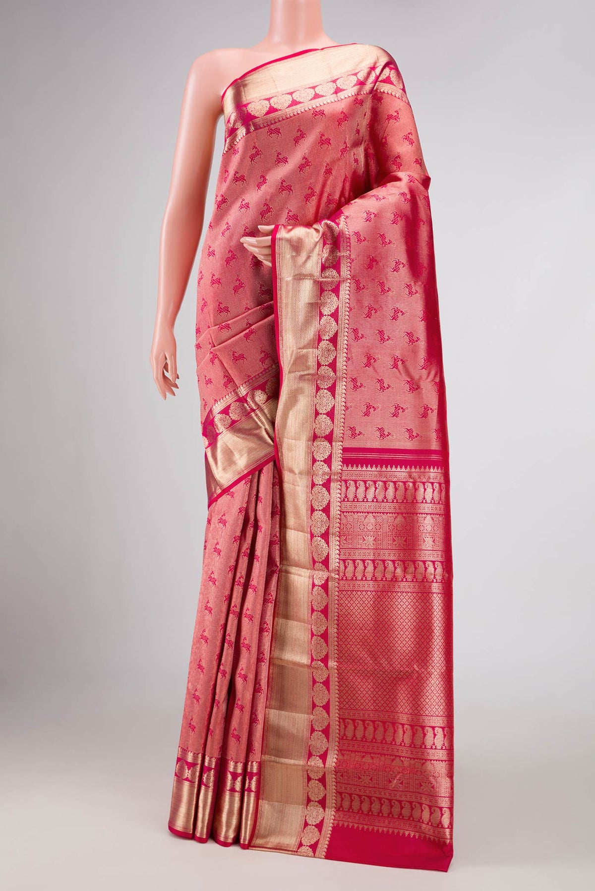 Dark Pink Dual Tone Kanchipuram Silk Saree with Zari Brocade on the body and Zari Border displayed on a mannequin