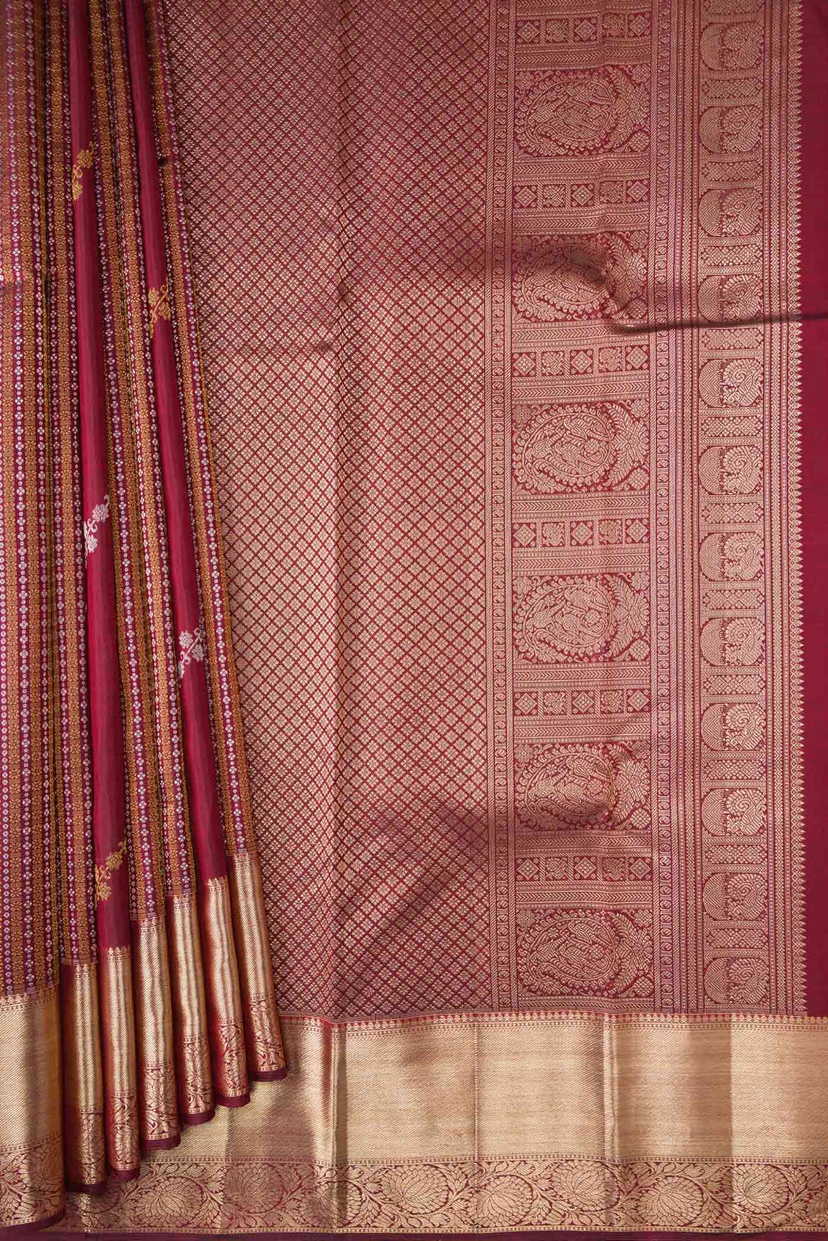 Pleats and pallu of Maroon Dual Tone Kanchipuram Silk Saree with Zari Brocade on the body and Zari Border