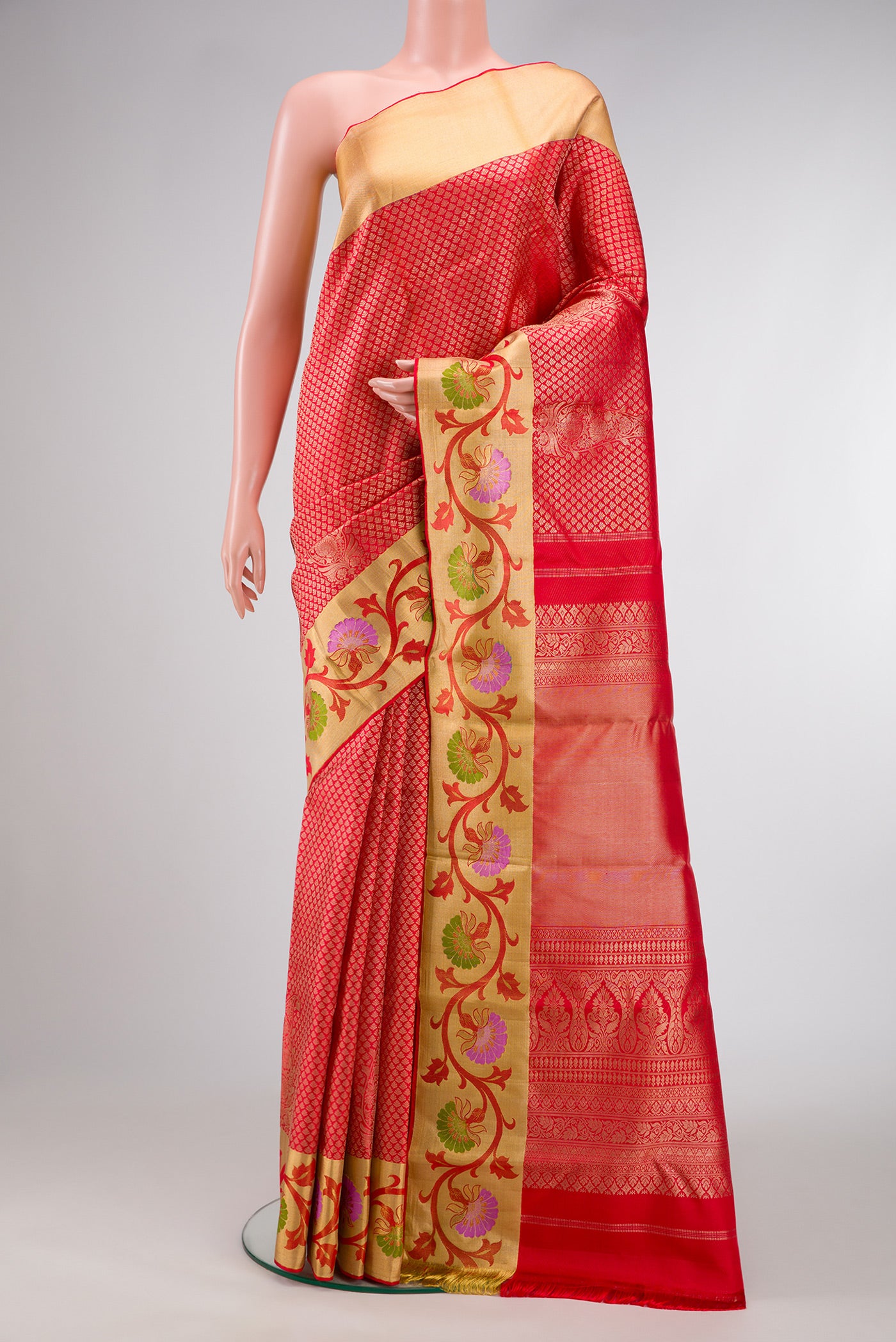 Red Dual Tone Kanjivaram Silk Saree with Zari Brocade on the body and Fancy Border.  displayed on a mannequin
