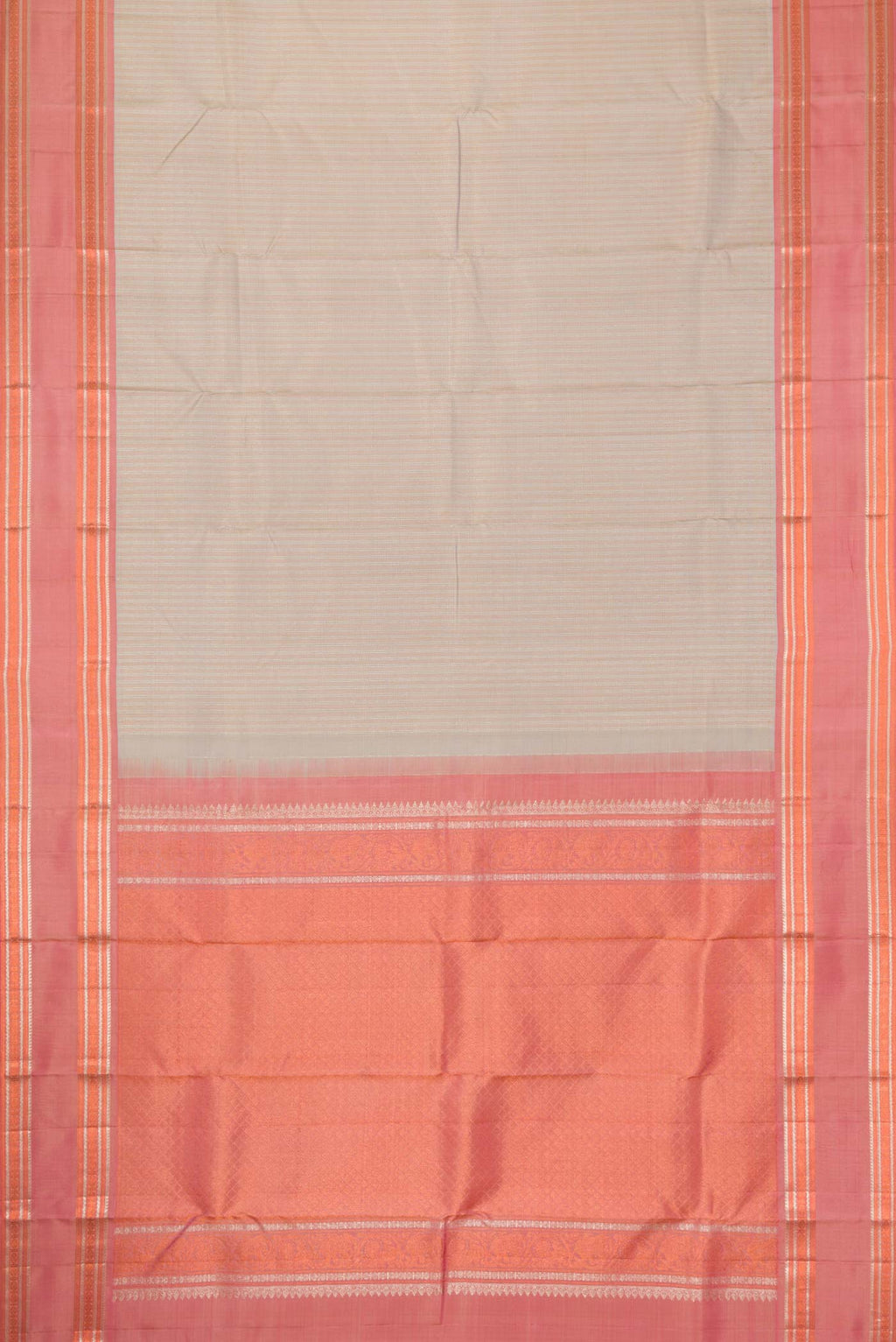 Flat view of Beige Dual Tone Kanchipuram Silk Saree with Stripes on the body and Zari Border. 