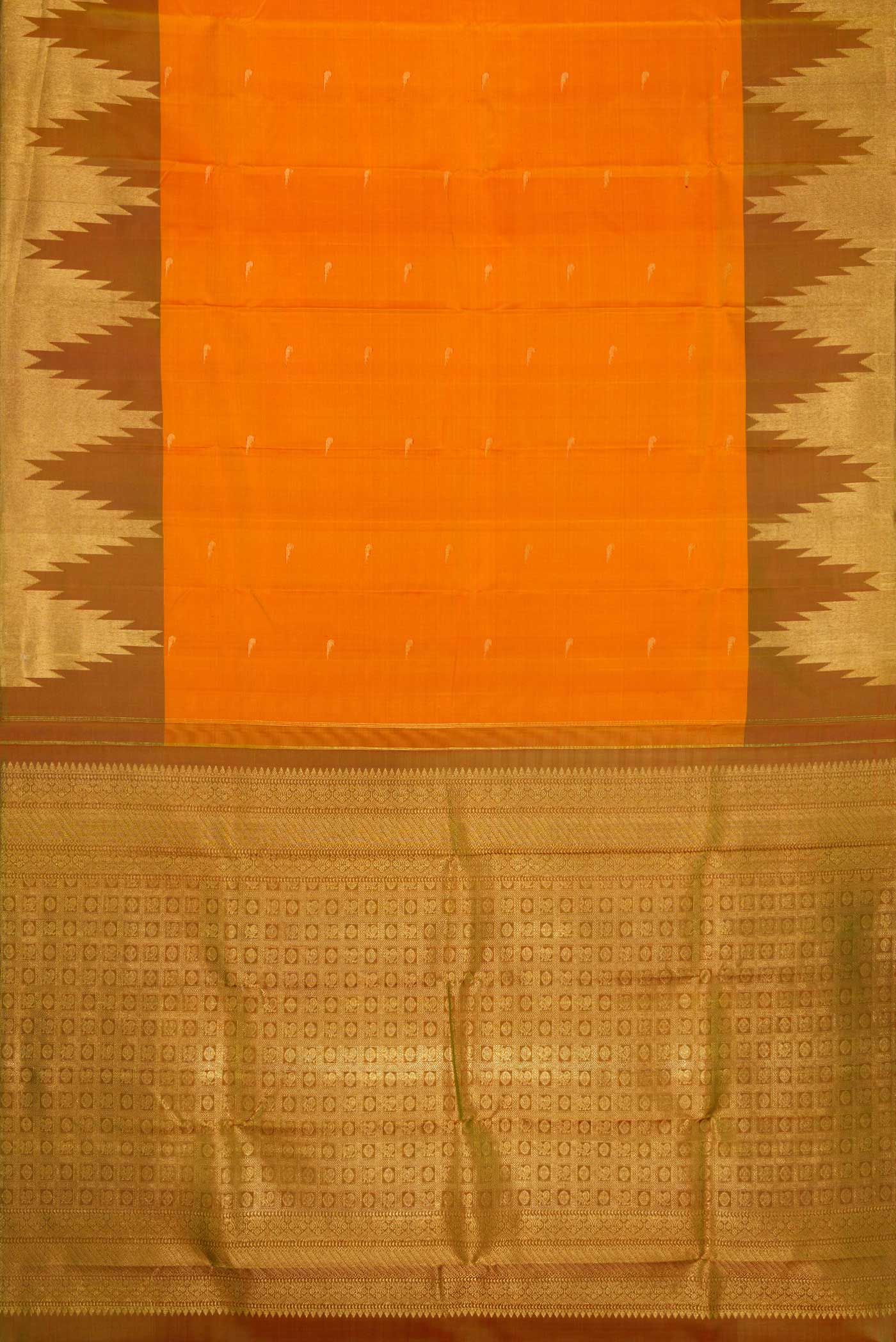Flat view of Mustard Dual Tone Kanjivaram Silk Saree with Zari Butta on the body and Temple Border. 