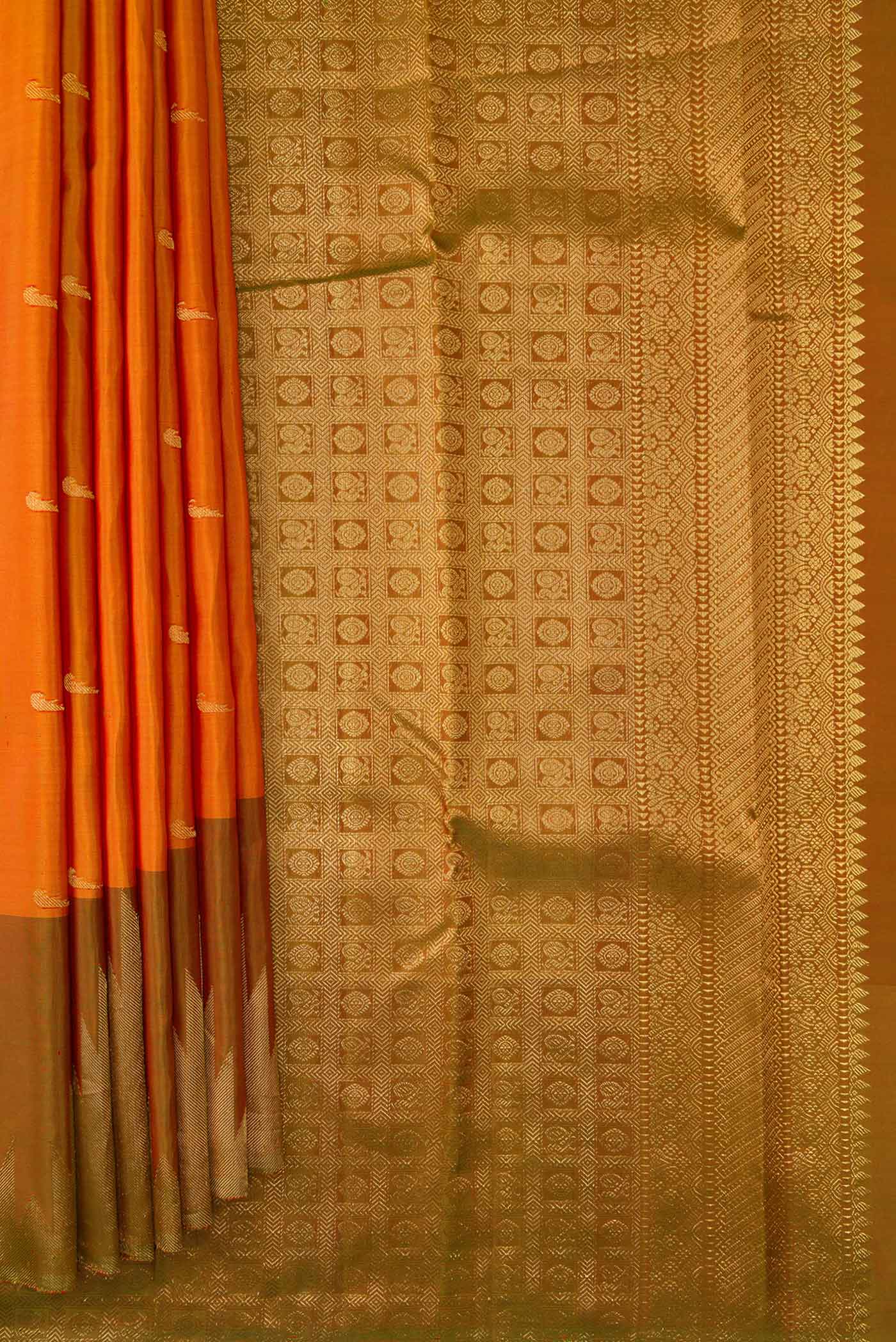 Pleats and pallu of Mustard Dual Tone Kanjivaram Silk Saree with Zari Butta on the body and Temple Border. 