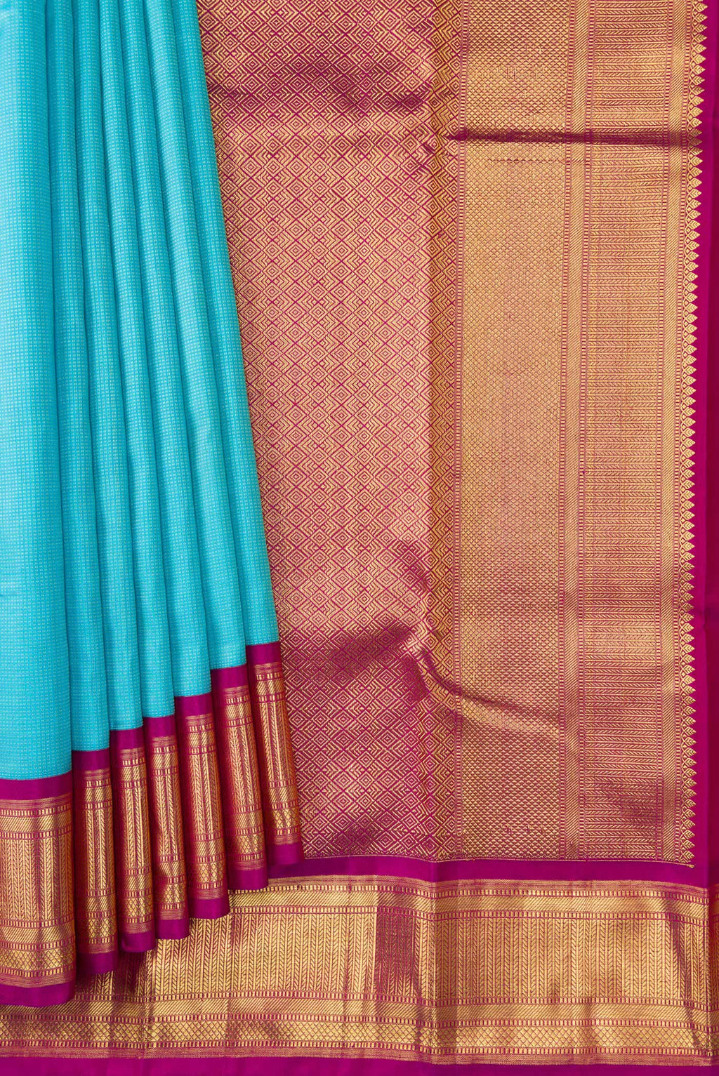 Pleats and pallu of Sky Blue Dual Tone Kanjivaram Silk Saree with Stripes on the body and Zari Border. 