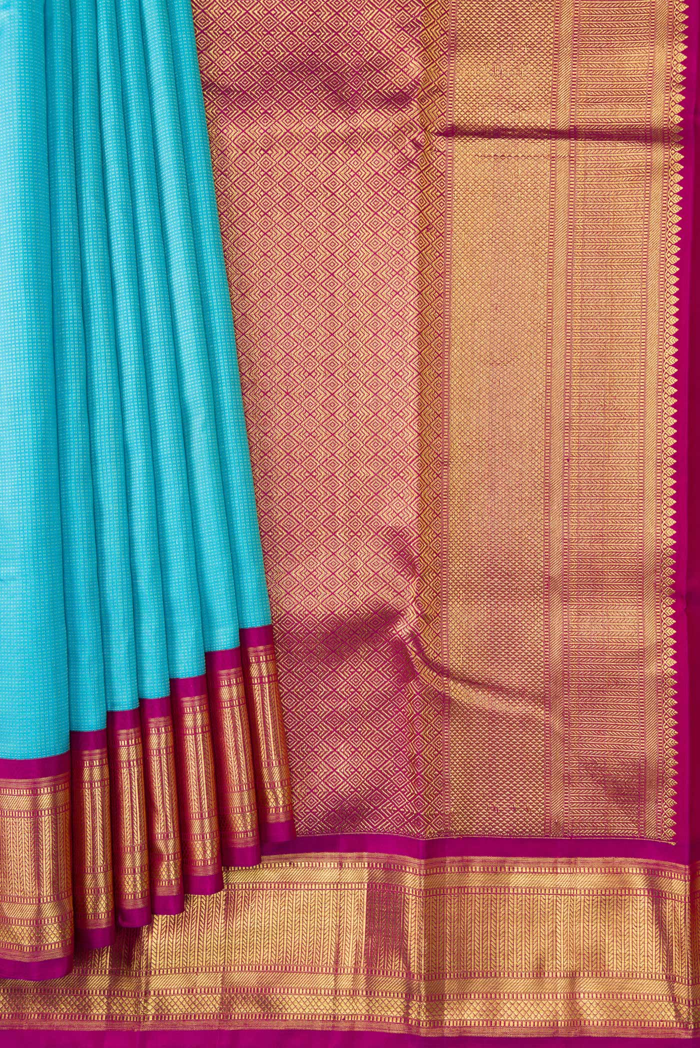 Pleats and pallu of Sky Blue Dual Tone Kanjivaram Silk Saree with Stripes on the body and Zari Border. 