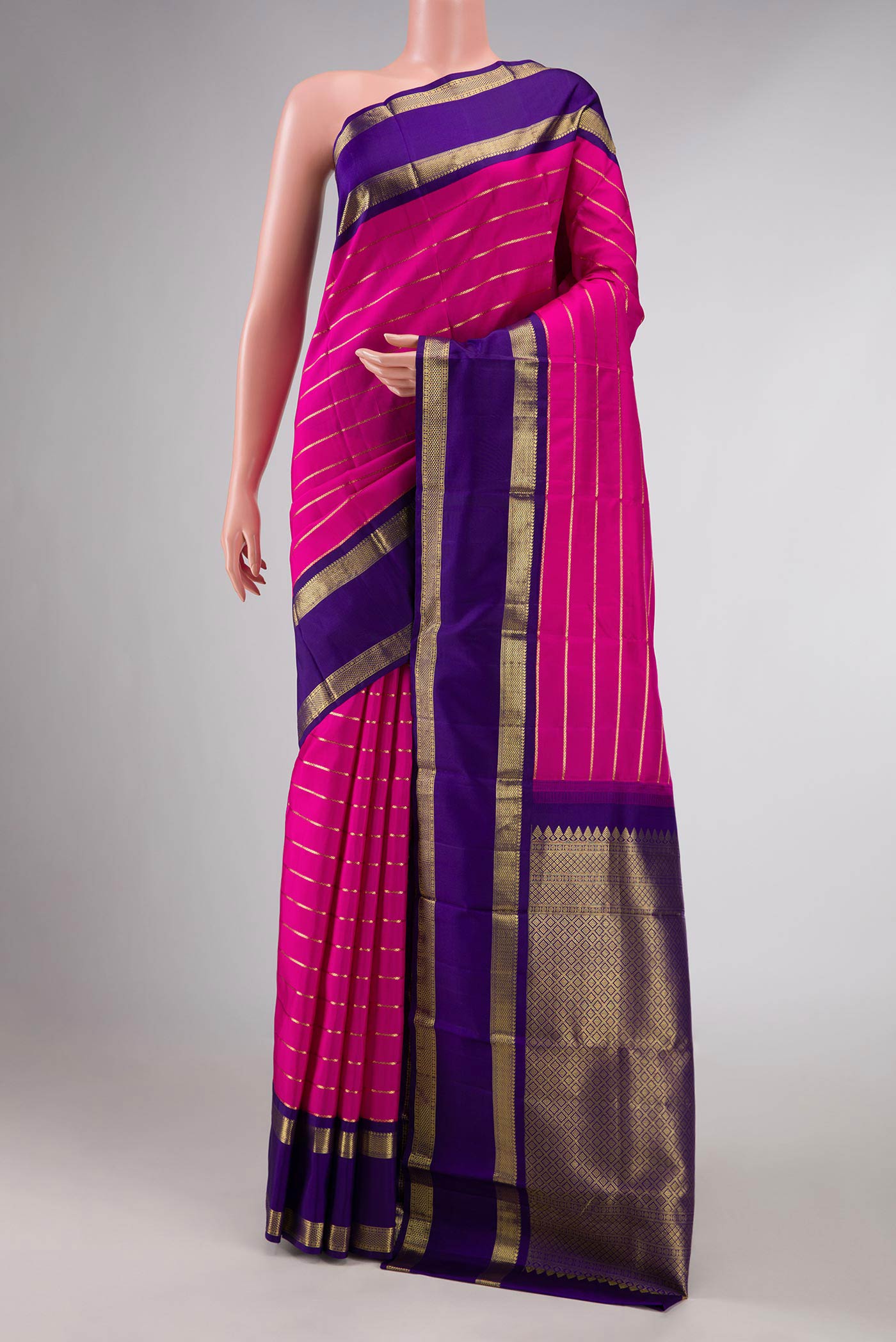 Pink Dual Tone Kanchipuram Silk Saree with Veldhari on the body and Zari Border displayed on a mannequin