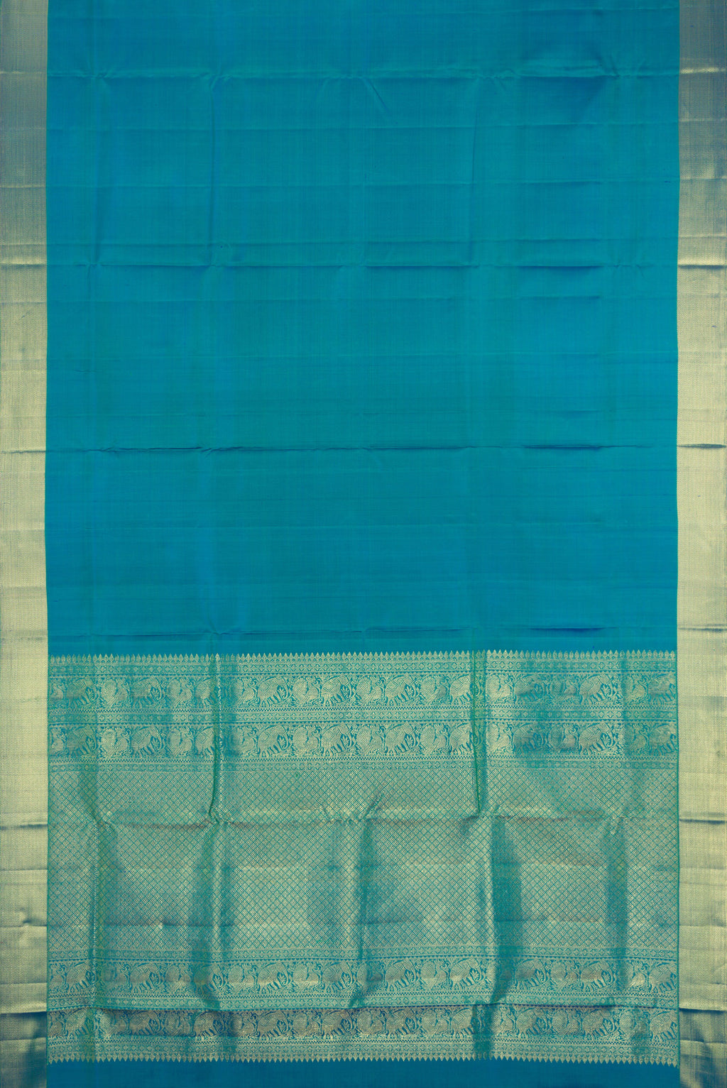 Flat view of Peacock Blue Dual Tone Kanjivaram Silk Nine Yards Saree with Plain Body and Zari Border. 