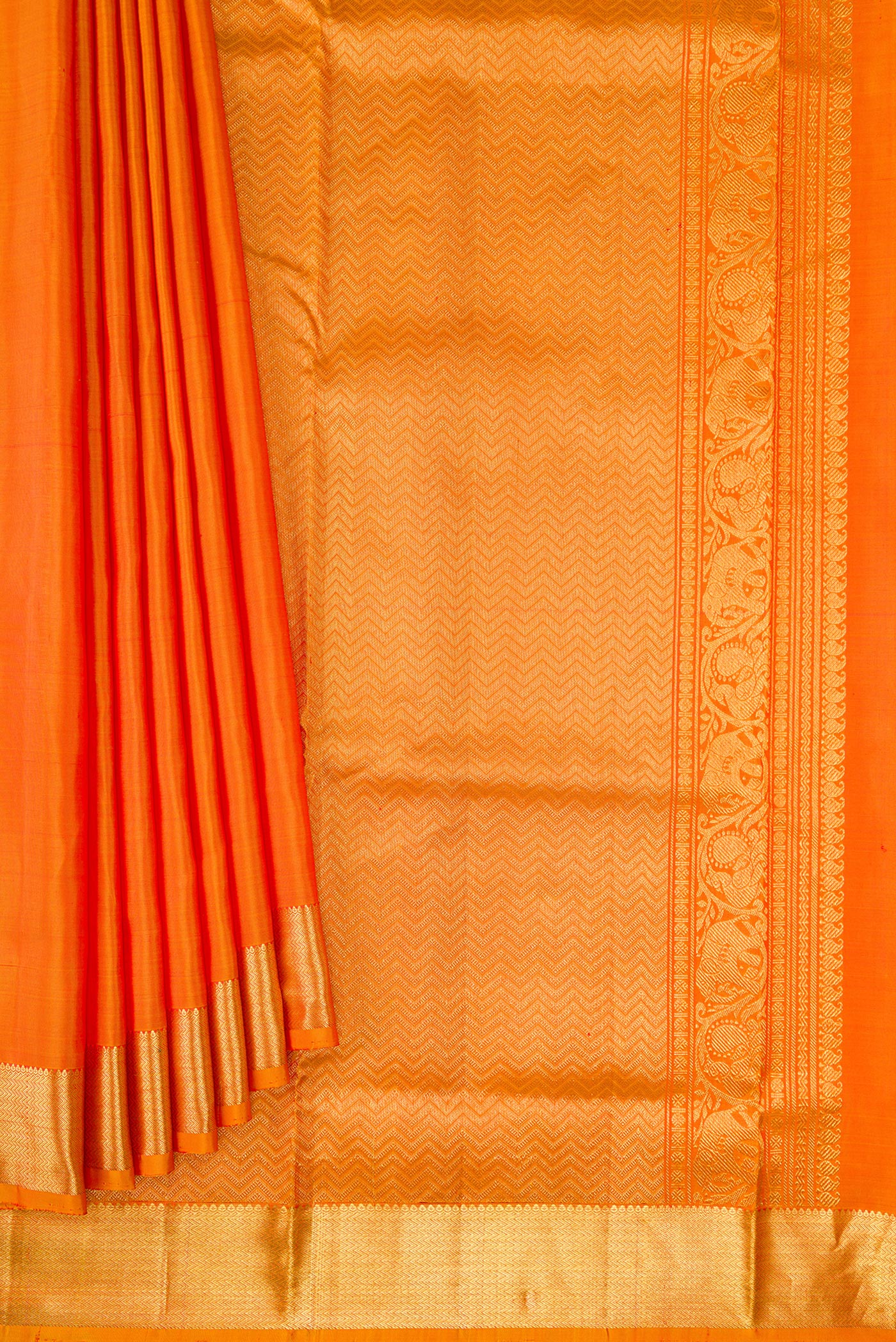Pleats and pallu of Orange Dual Tone Kanjivaram Silk Nine Yards Saree with Plain Body and Zari Border. 