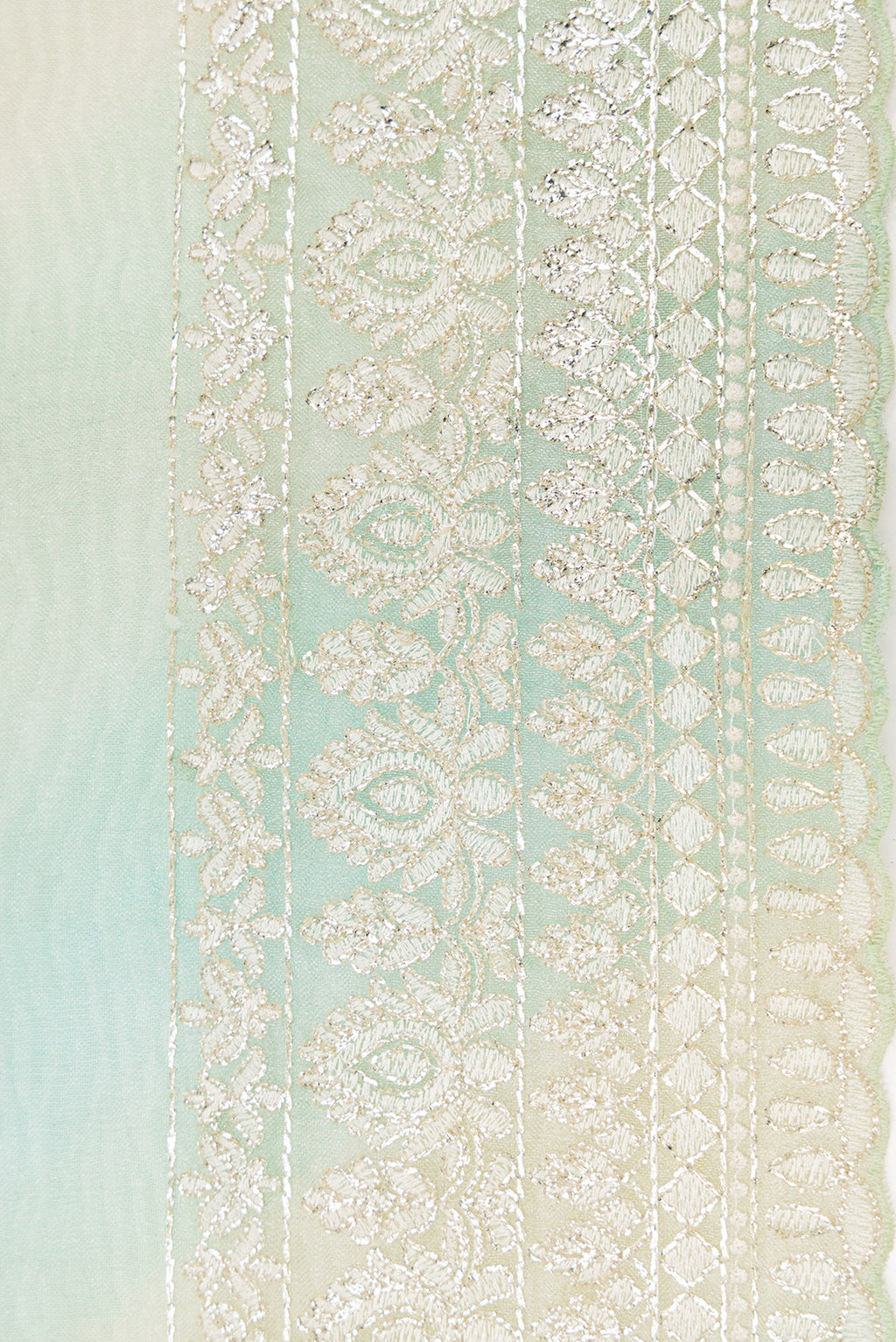 Border image of Pista Green Dual Tone Organza Silk Saree with Stripes on the body and Embroidery Border. 