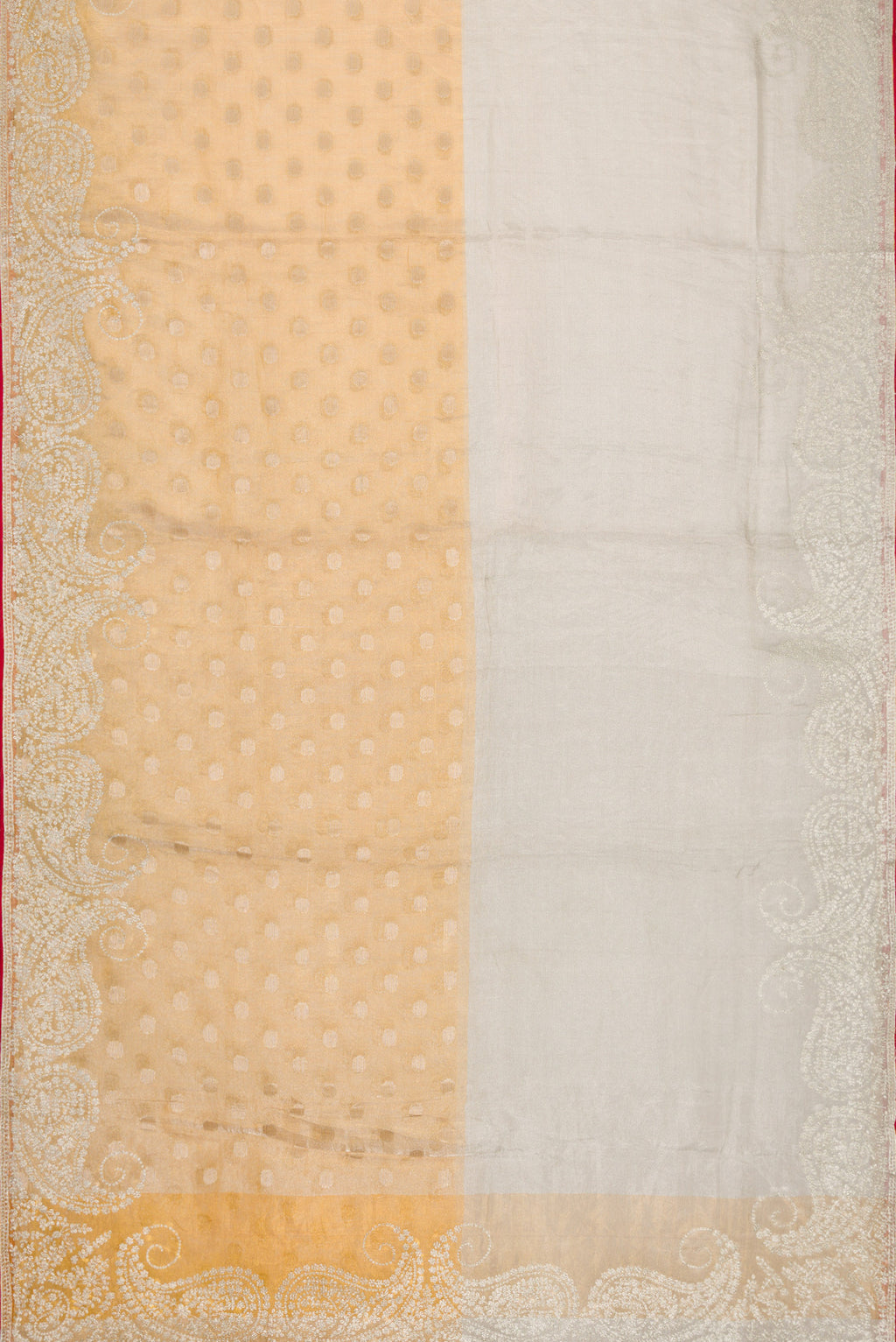 Flat view of Gold Dual Tone Organza Silk Saree with Zari Butta on the body and Embroidery Border. 
