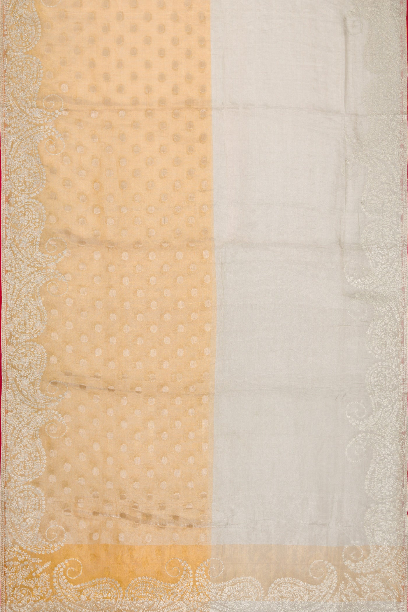 Flat view of Gold Dual Tone Organza Silk Saree with Zari Butta on the body and Embroidery Border. 