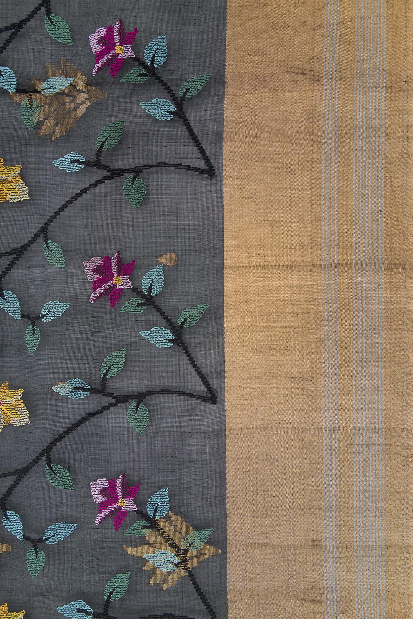 Border image of Black Dual Tone Tussar Silk Saree with Embroidery on the body and Zari Border. 