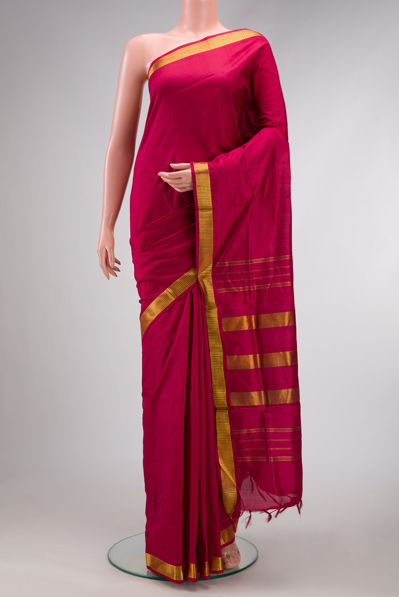 Maroon Dual Tone Kanjivaram Silk Nine Yards Saree with Plain Body and Zari Border.  displayed on a mannequin