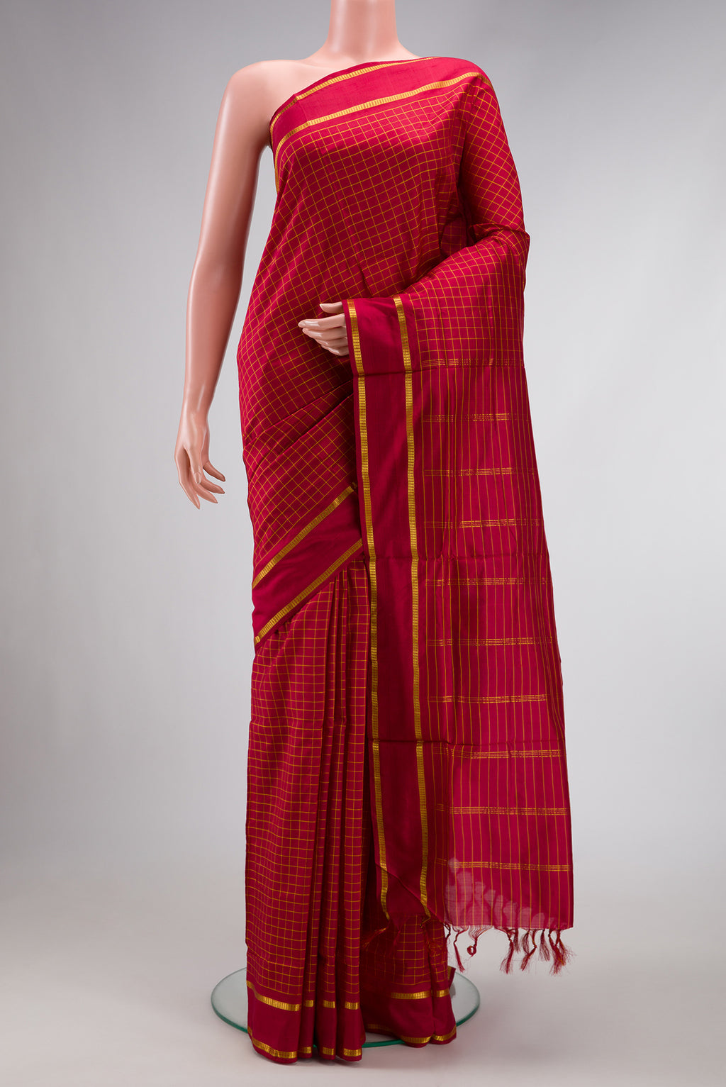 Pure Silk Pure Zari Maroon Dual Tone Kanchipuram Nine Yards Saree with Checked design on the body and Zari Border.  displayed on a mannequin
