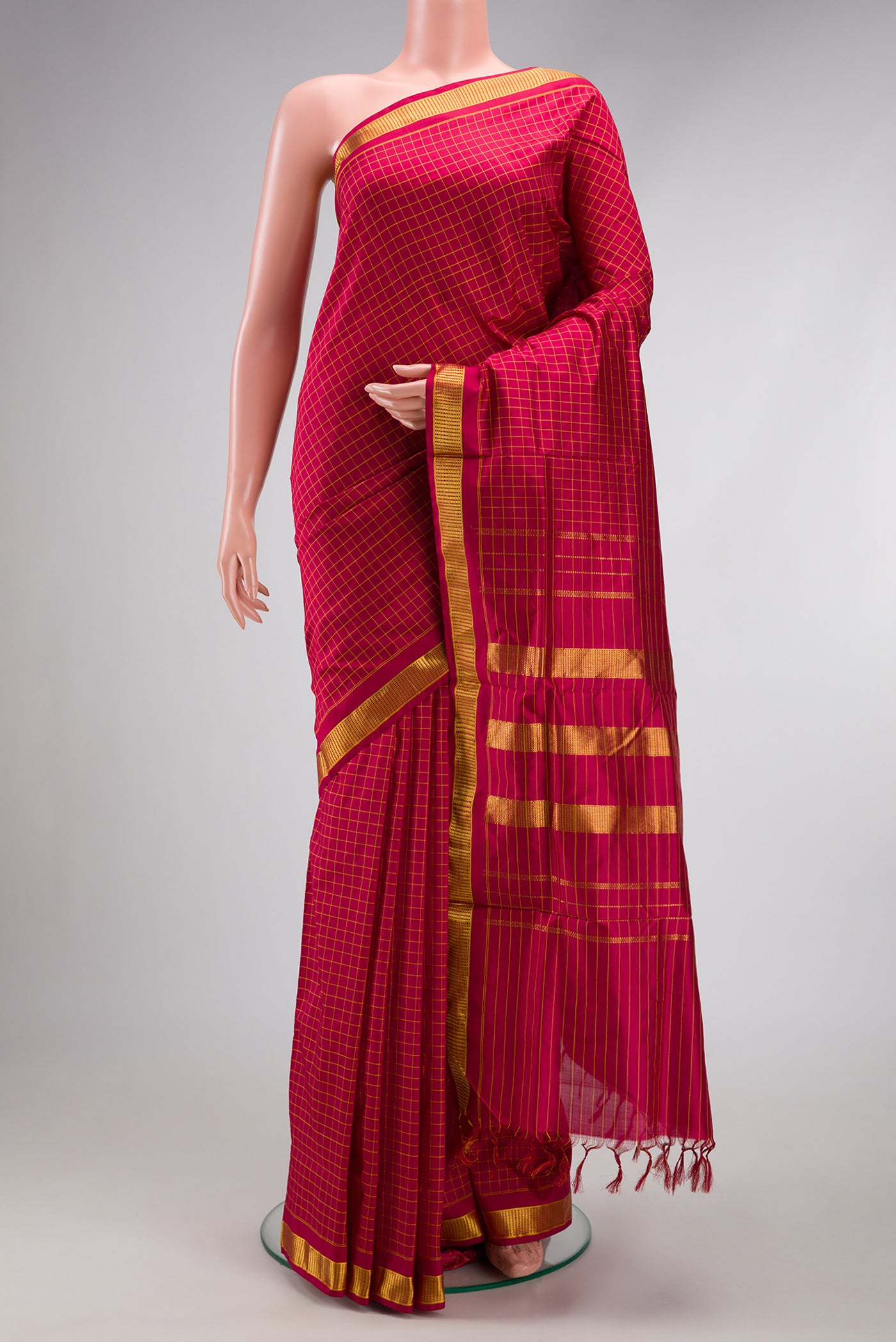 Maroon Dual Tone Kanjivaram Silk Nine Yards Saree with Checked design on the body and Zari Border.  displayed on a mannequin