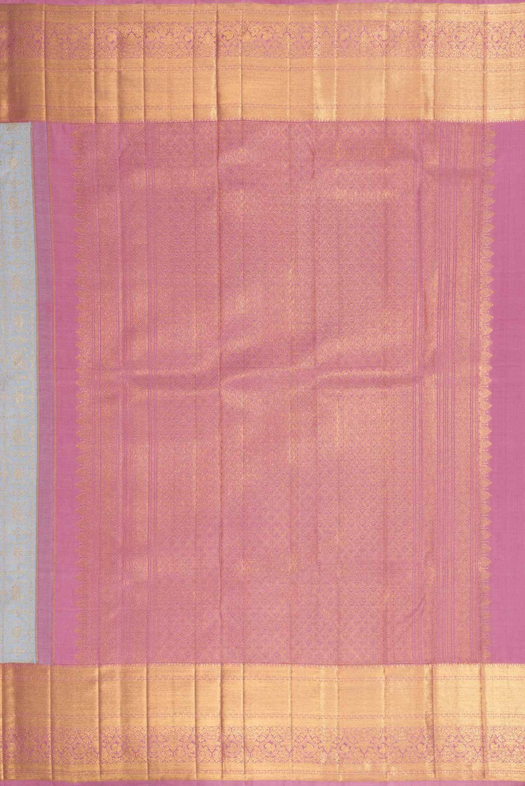 Close up image of the pallu of Grey Dual Tone Kanchipuram Silk Saree with Zari Brocade on the body and Zari Border. 